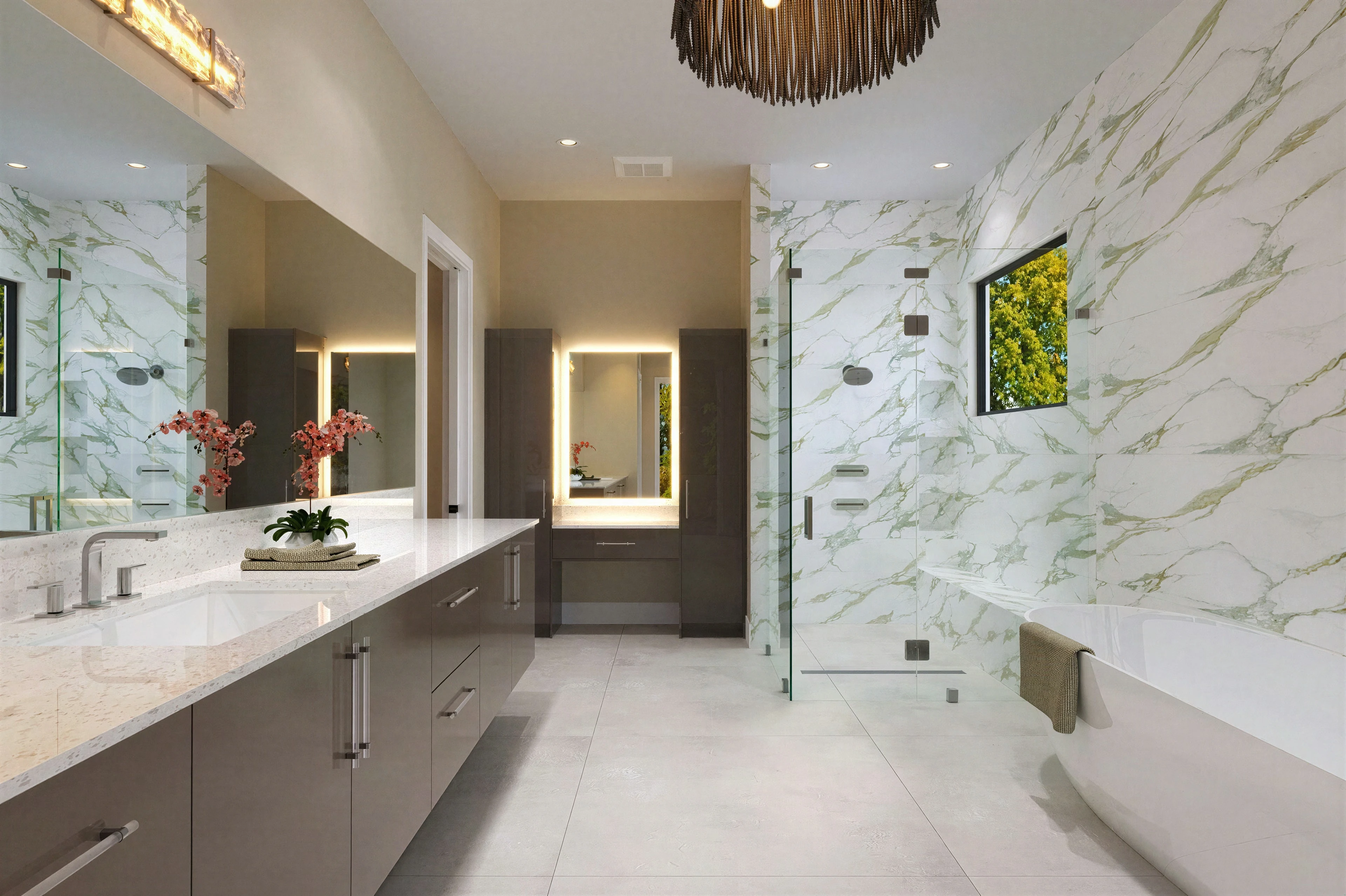 Bathroom vanity beside a glass shower enclosure.