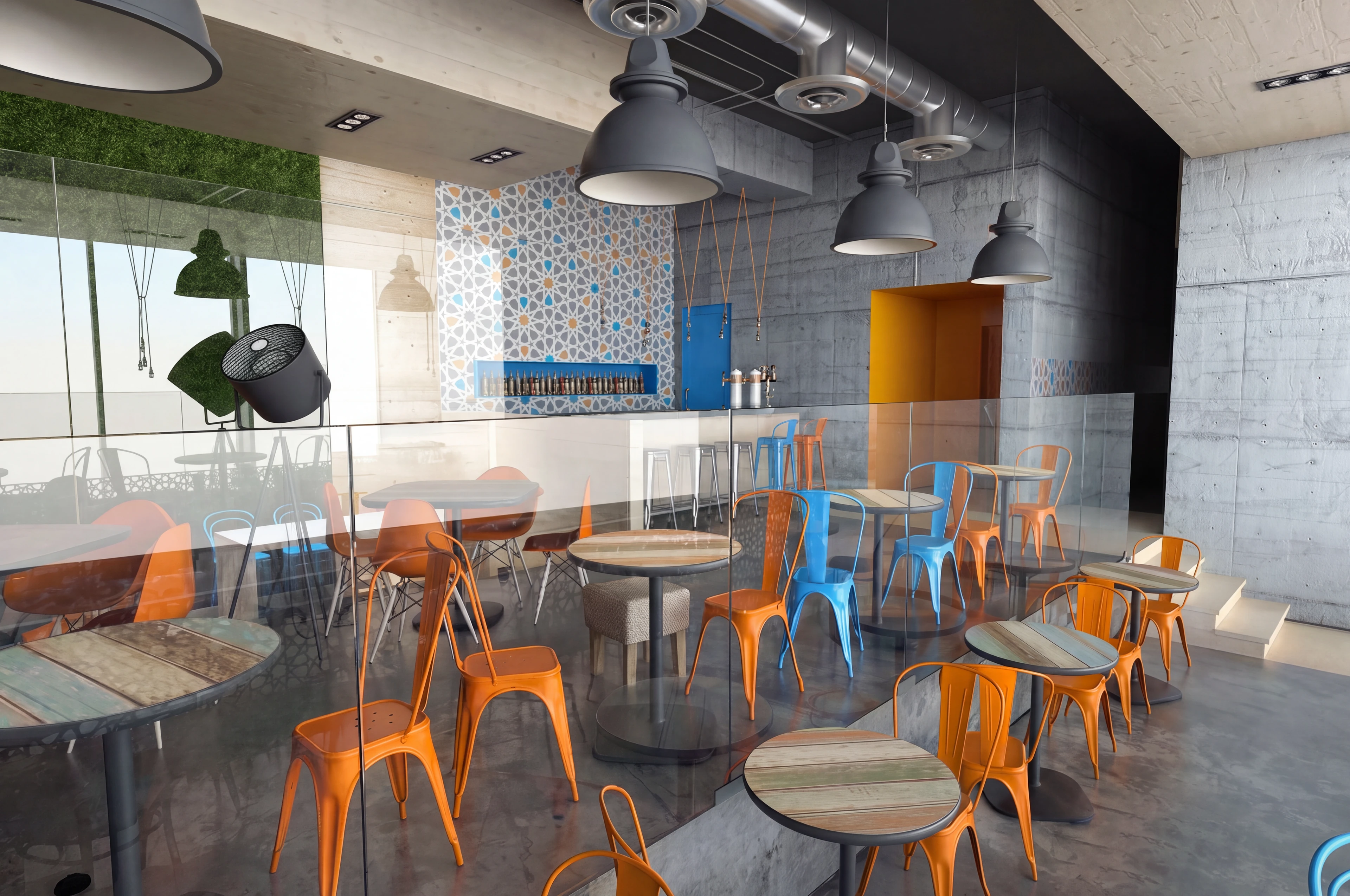 Bar seating area with bright chairs and industrial pendant lights.