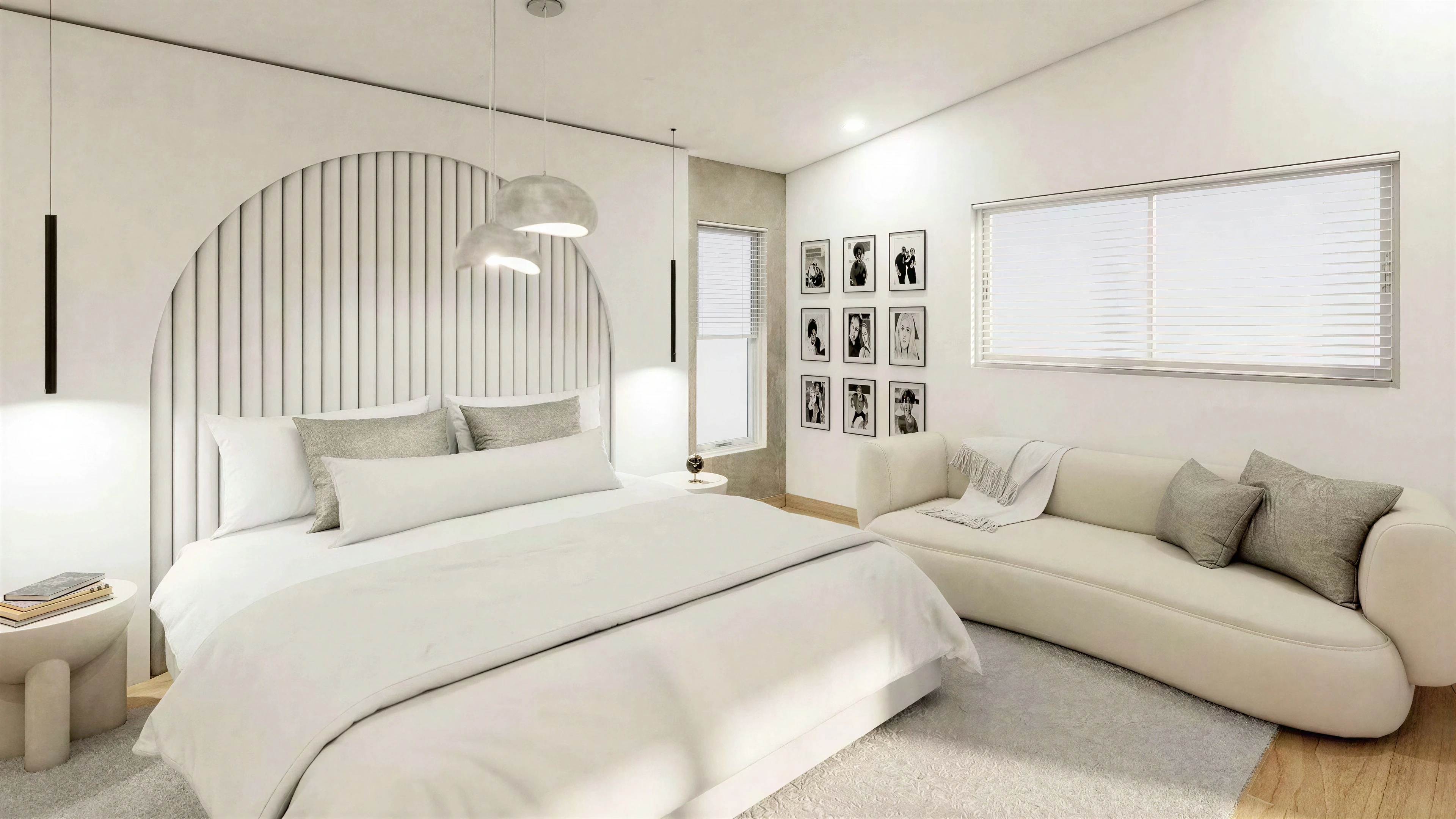 Bedroom with an arched headboard feature and curved sofa.