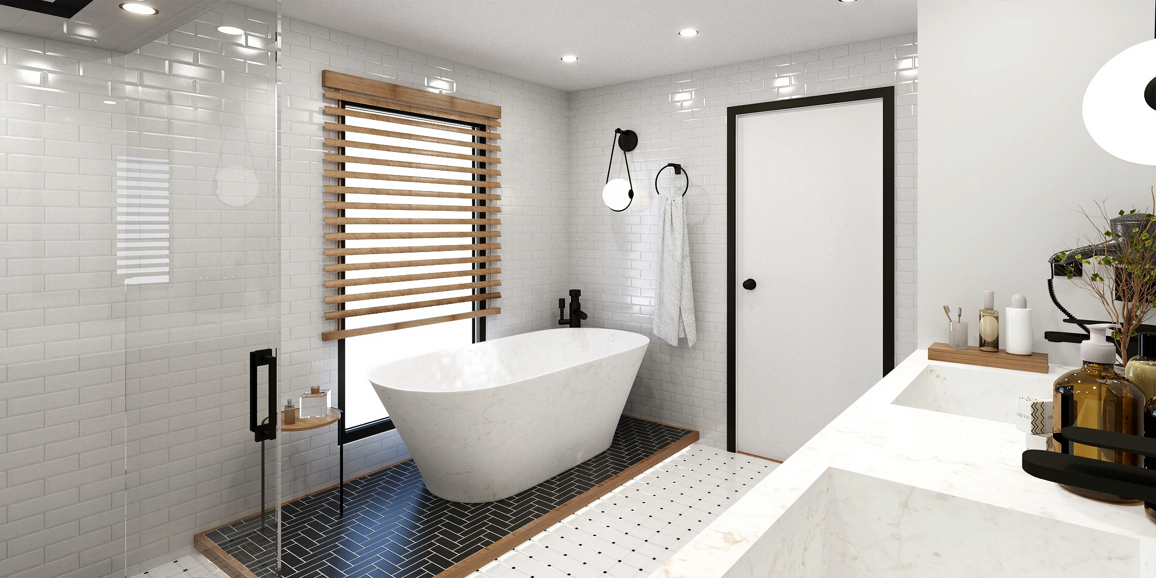 Freestanding tub beside the glass shower enclosure.