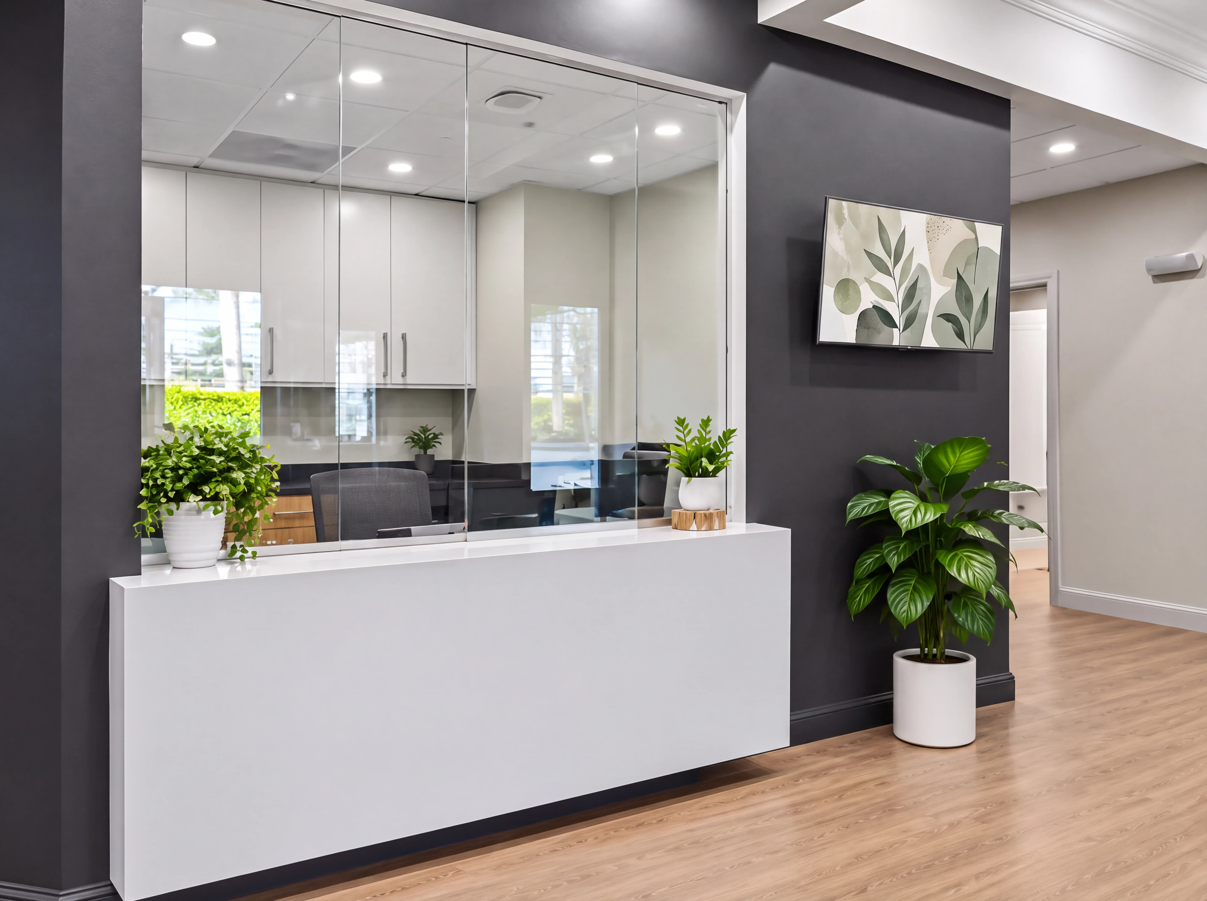Supplemental Bishop Health project study of the white reception counter, glazed pass-through and charcoal millwork.
