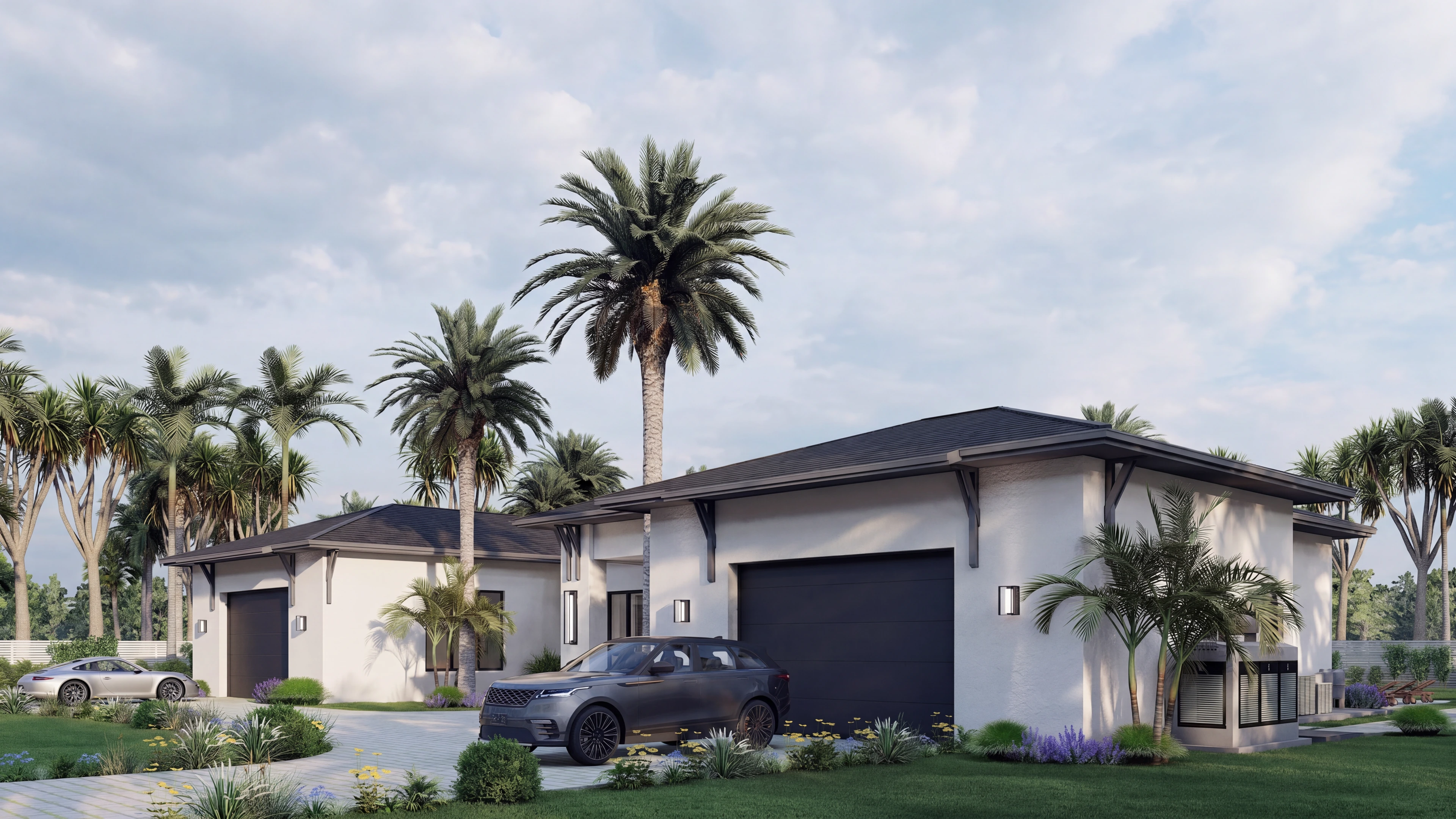 Garage and driveway beside the landscaped front entrance.
