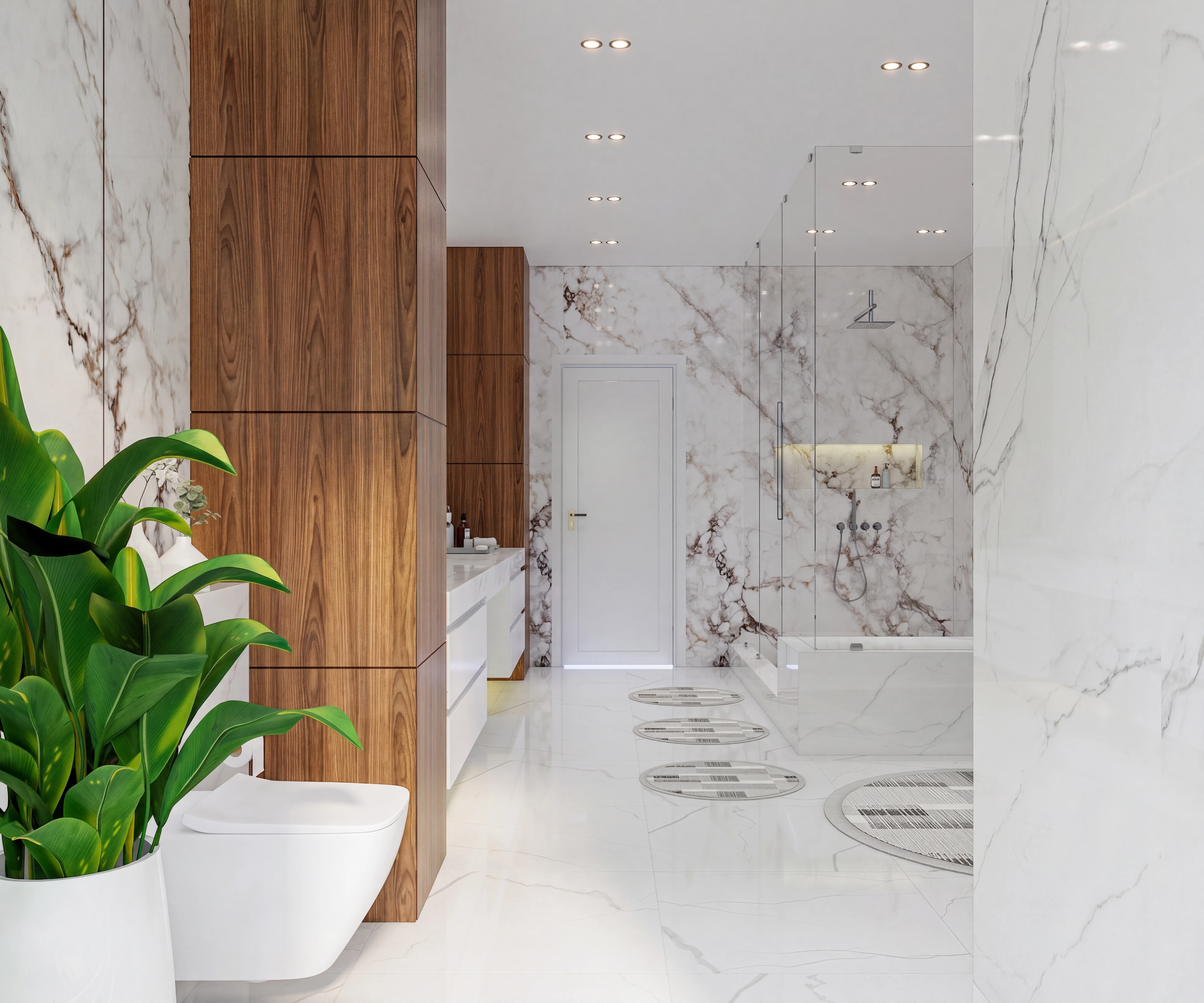 Glass shower and bathroom flooring beside a large plant.