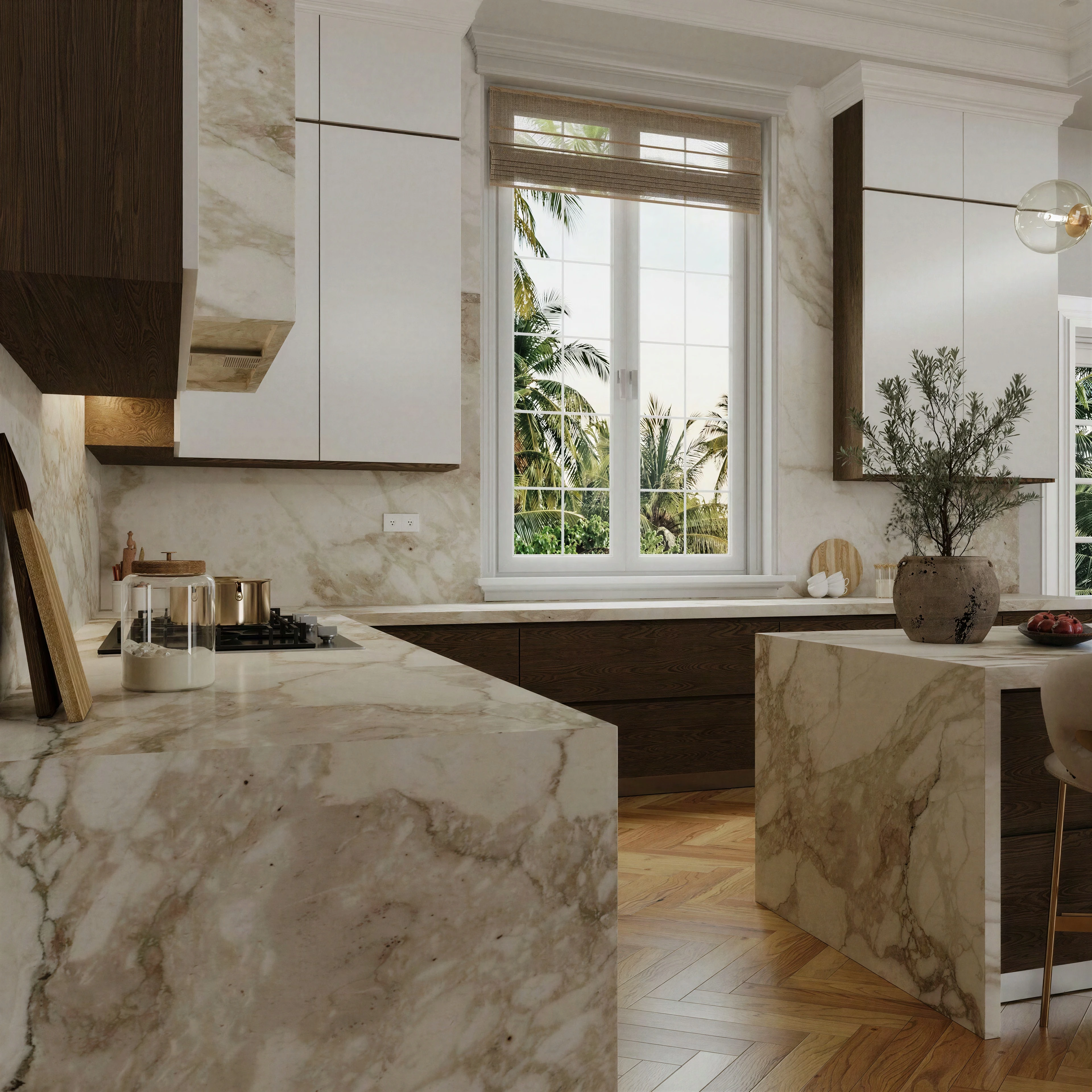 Kitchen work area framed by stone surfaces and a large window.