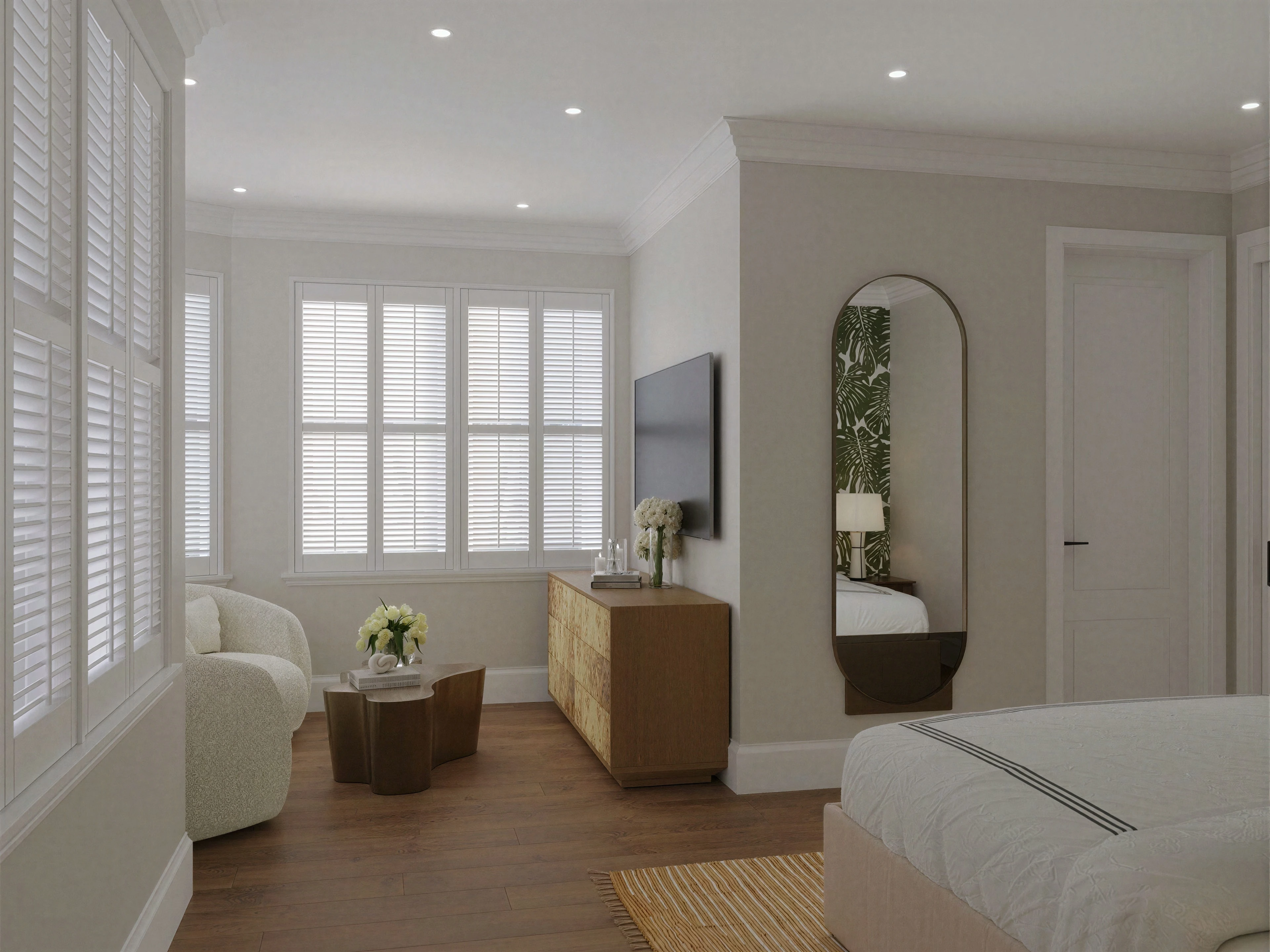 Bedroom with a window-side sitting area.