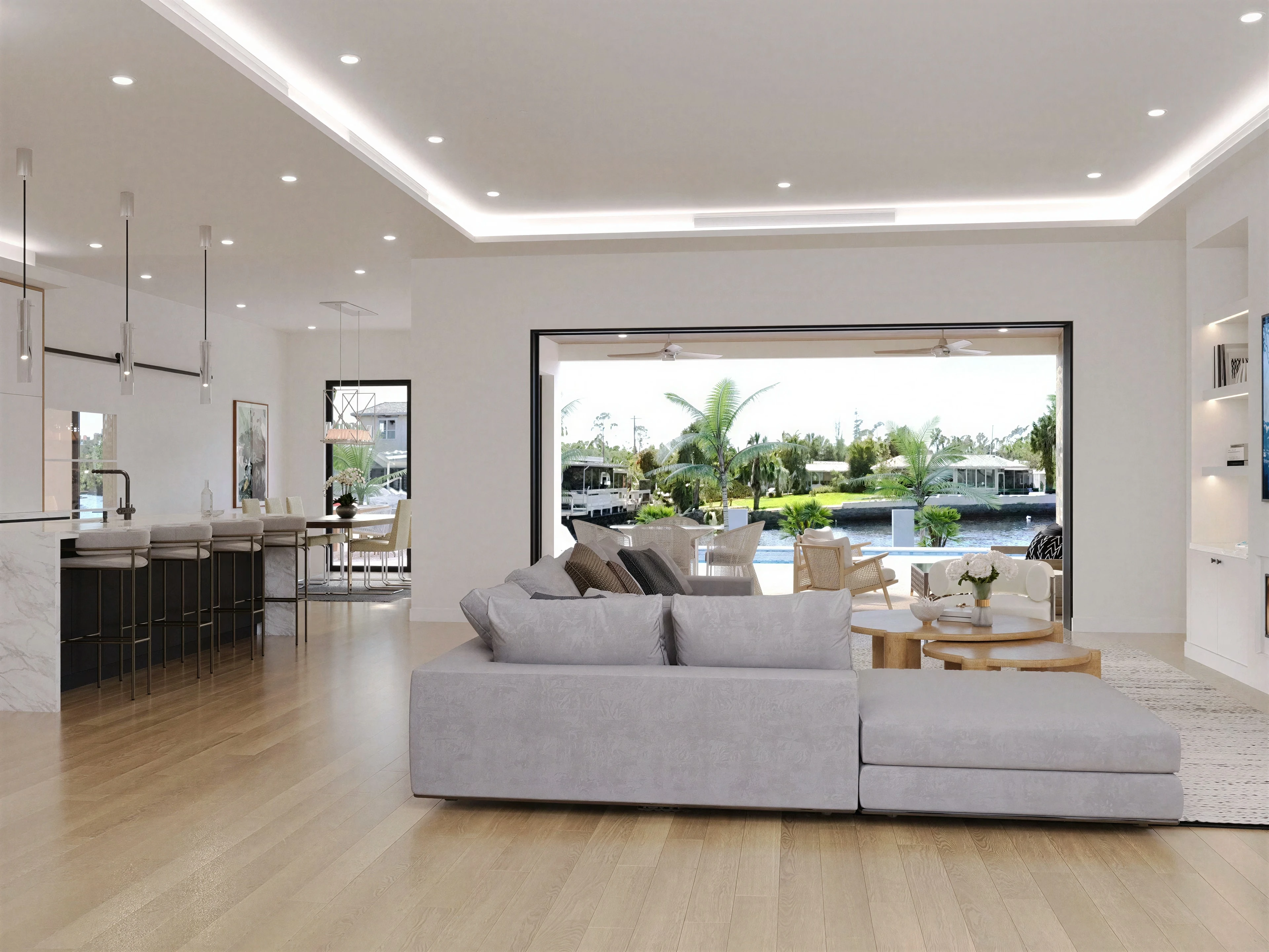 Living room and kitchen connected by a broad open layout.