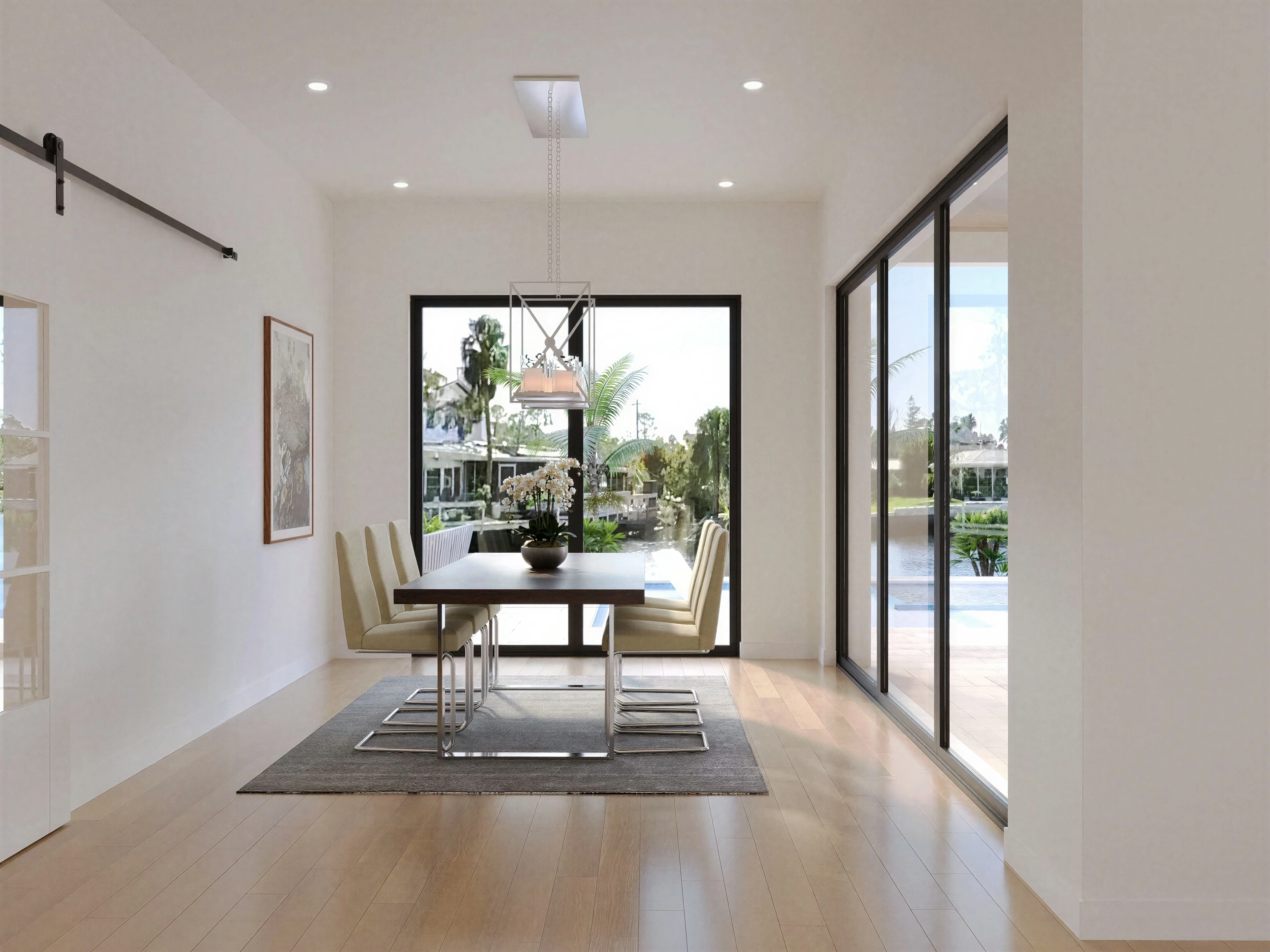 Entry hallway with a console table and garden-facing glazing.