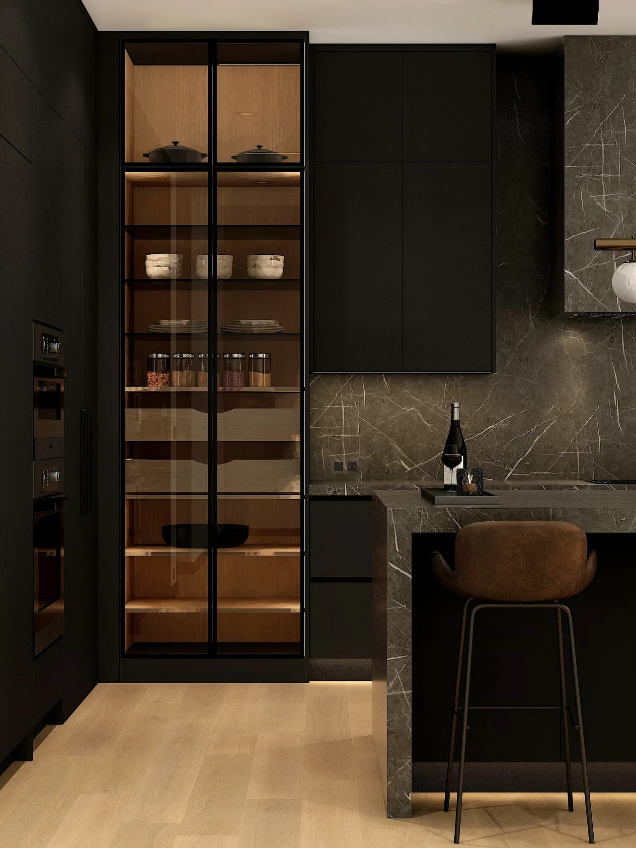 Tall kitchen storage beside dark cabinetry and a stone counter.