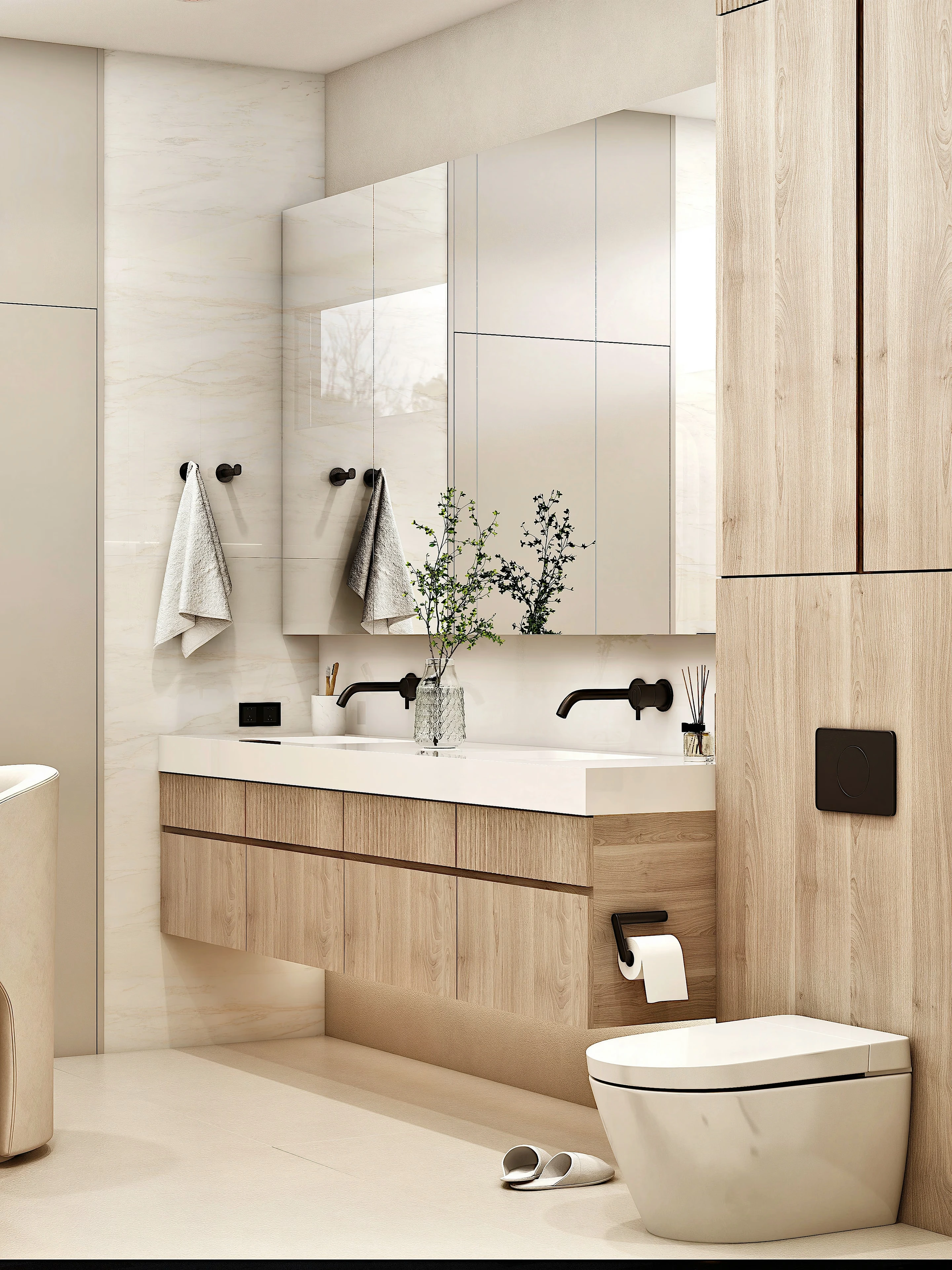 Bathroom vanity and toilet with warm concealed lighting.