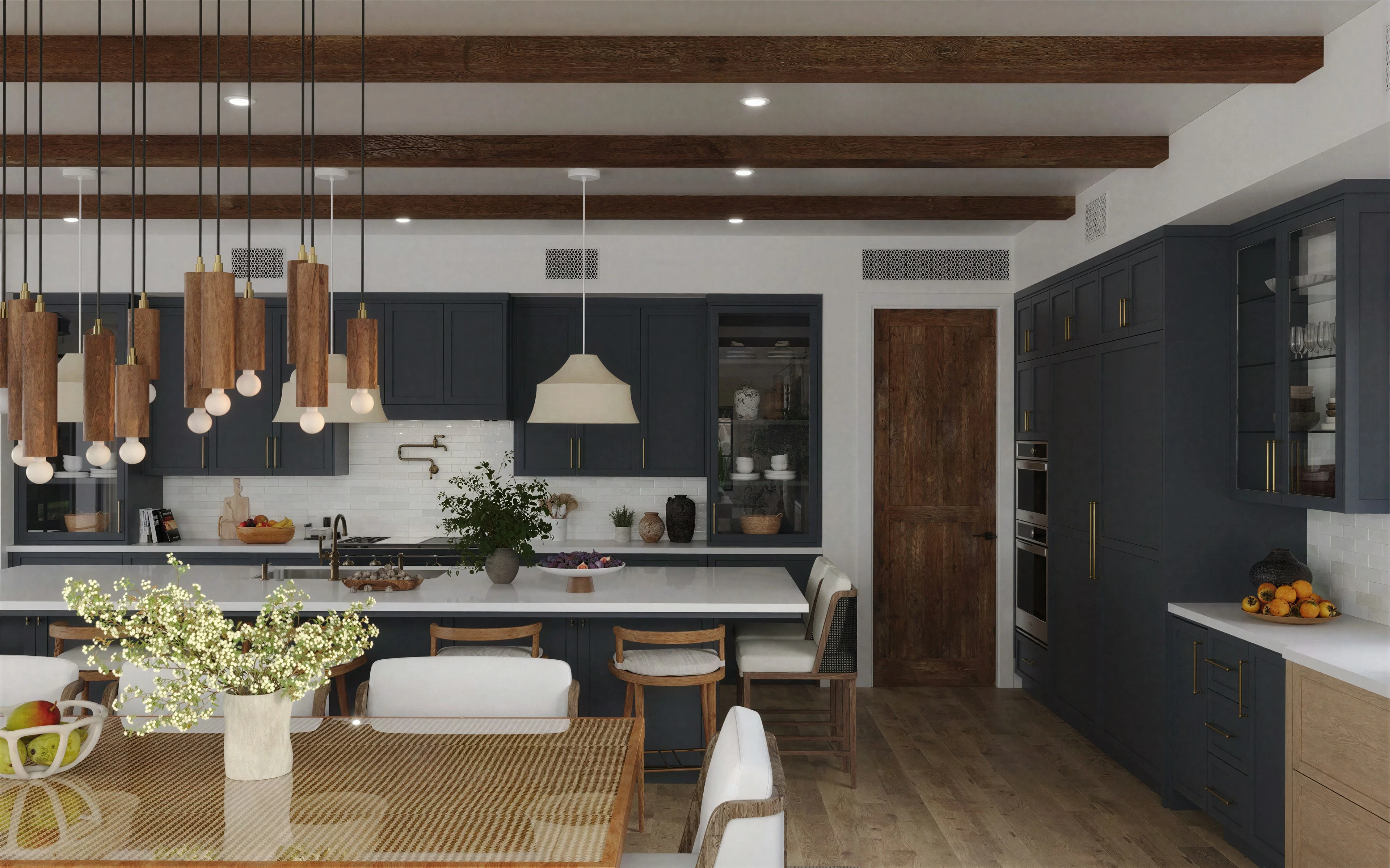 Kitchen with exposed wood beams and dark cabinetry.