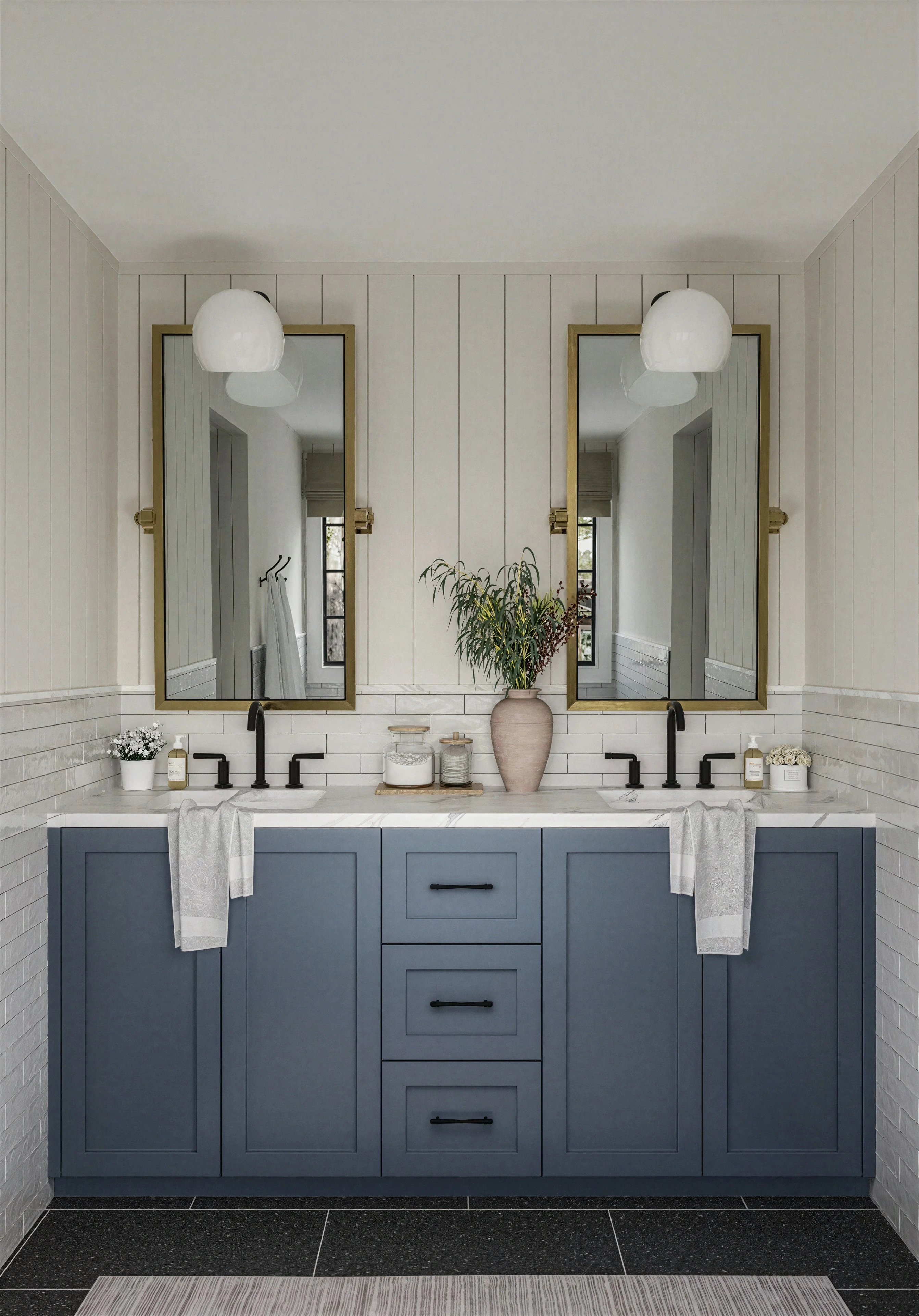 Blue bathroom vanity with paired mirrors and wall lights.