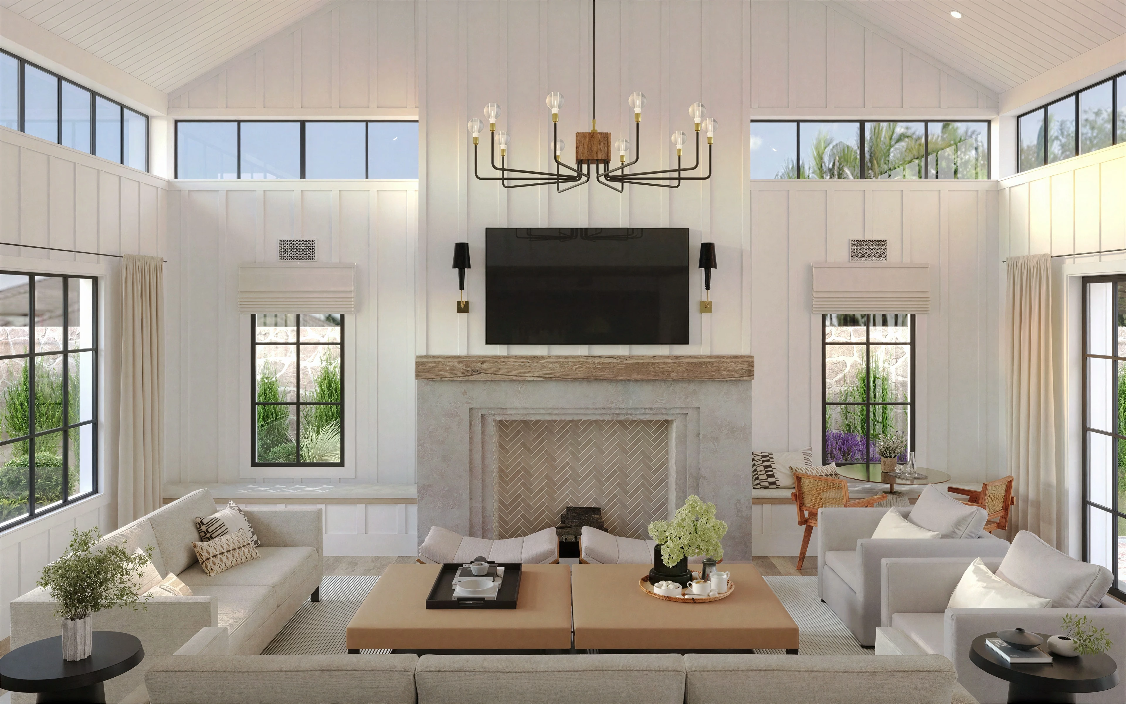Living room with a double-height fireplace wall and broad windows.
