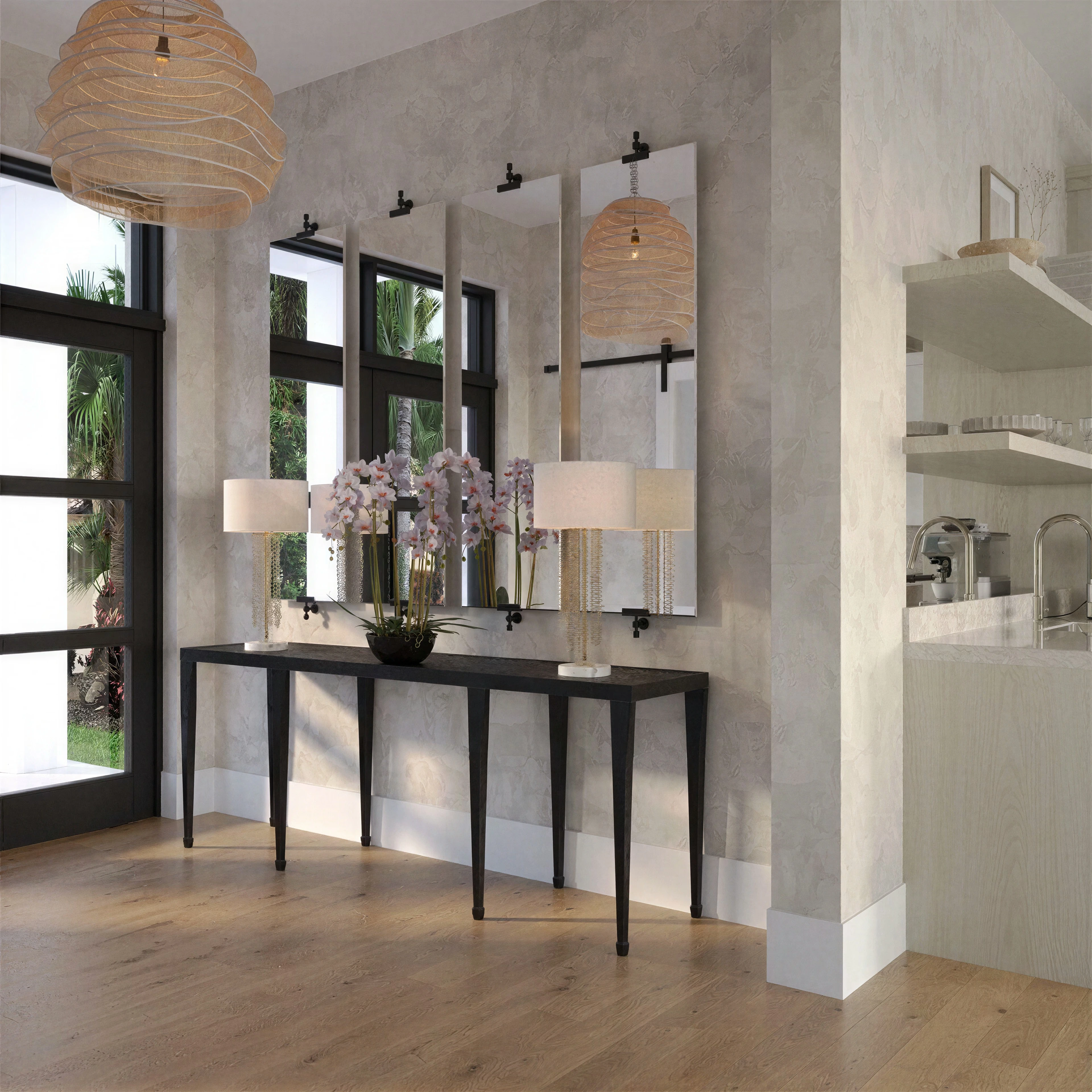 Entry console beneath a tall mirror and pendant light.