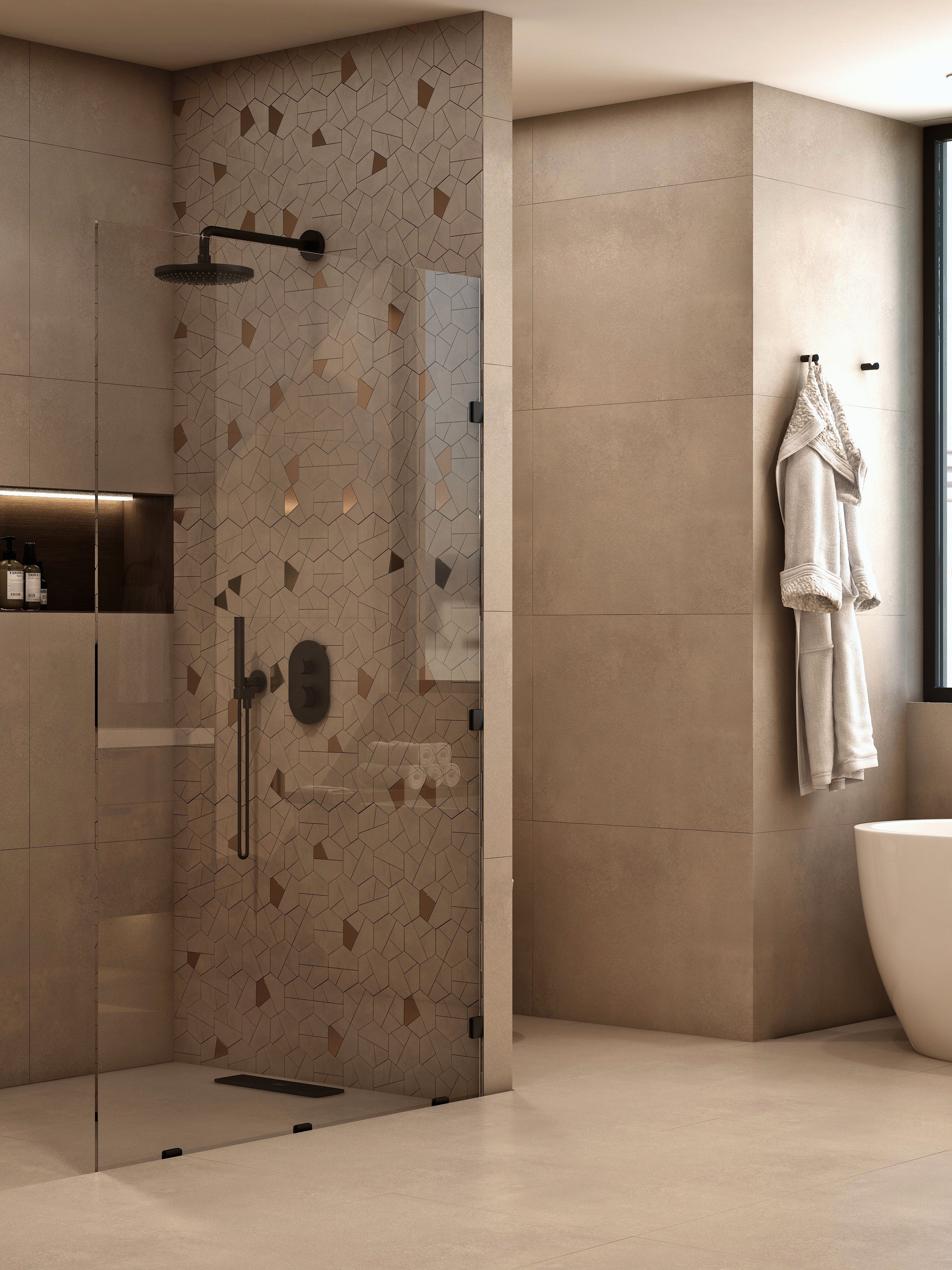 Glass shower enclosure beside the toilet and window.