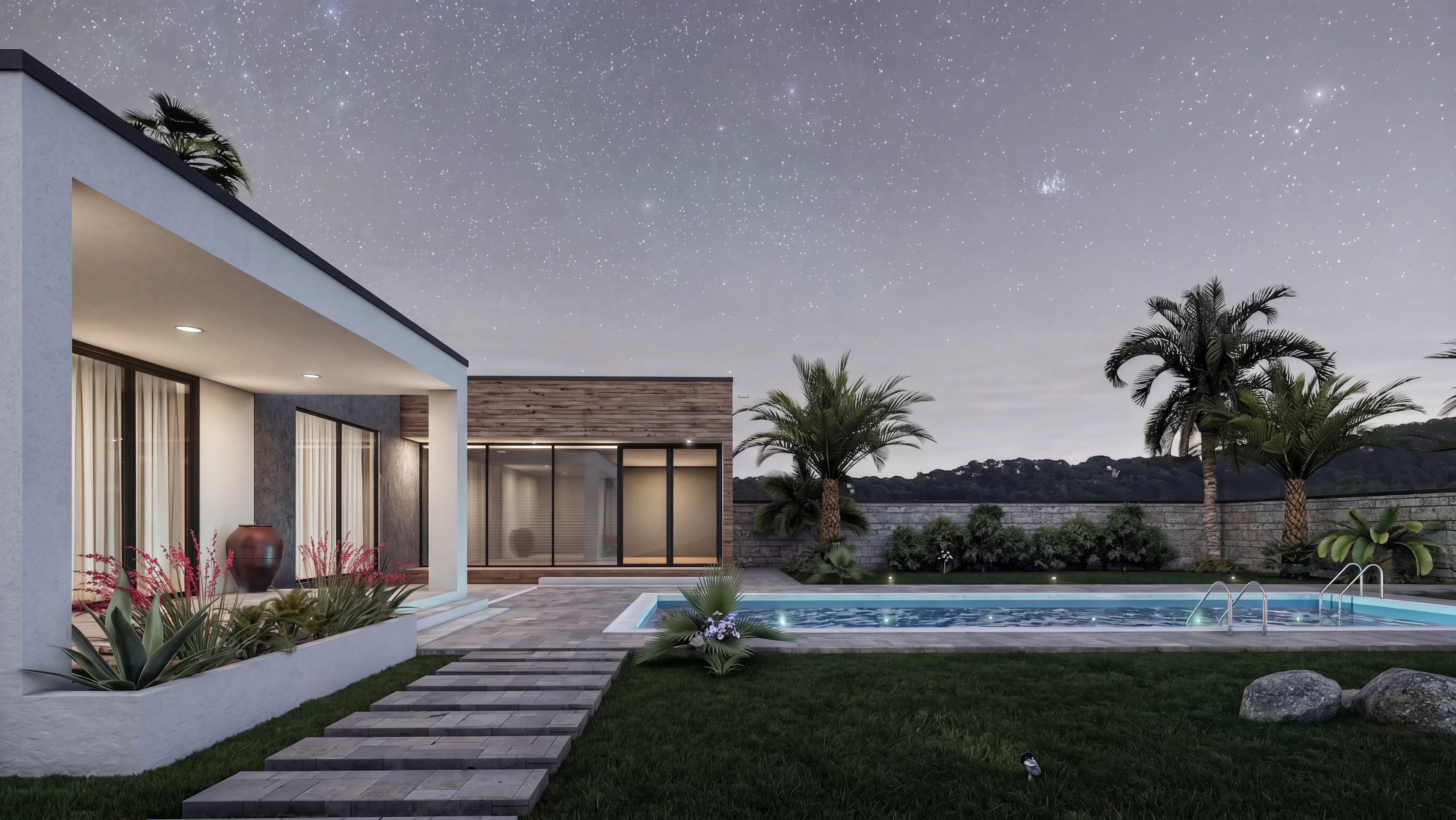 Poolside garden and glazed rooms illuminated at dusk.