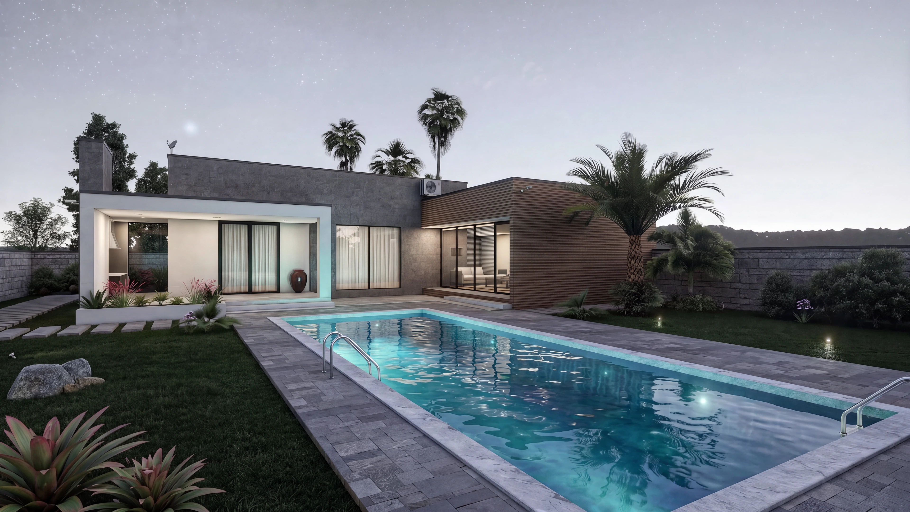 Wide evening view of the pool and landscaped backyard.