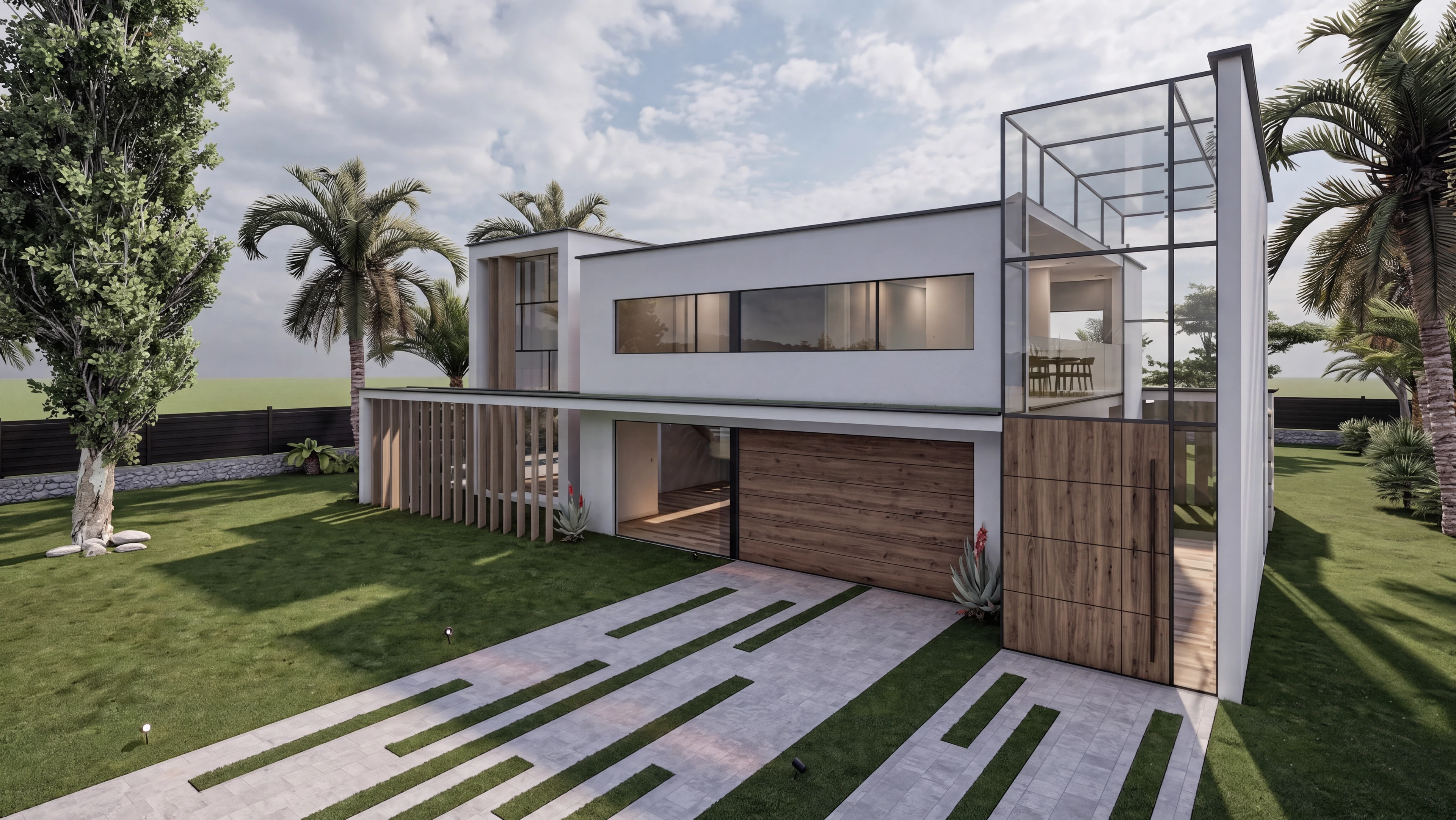 Front exterior with a garage and patterned driveway.