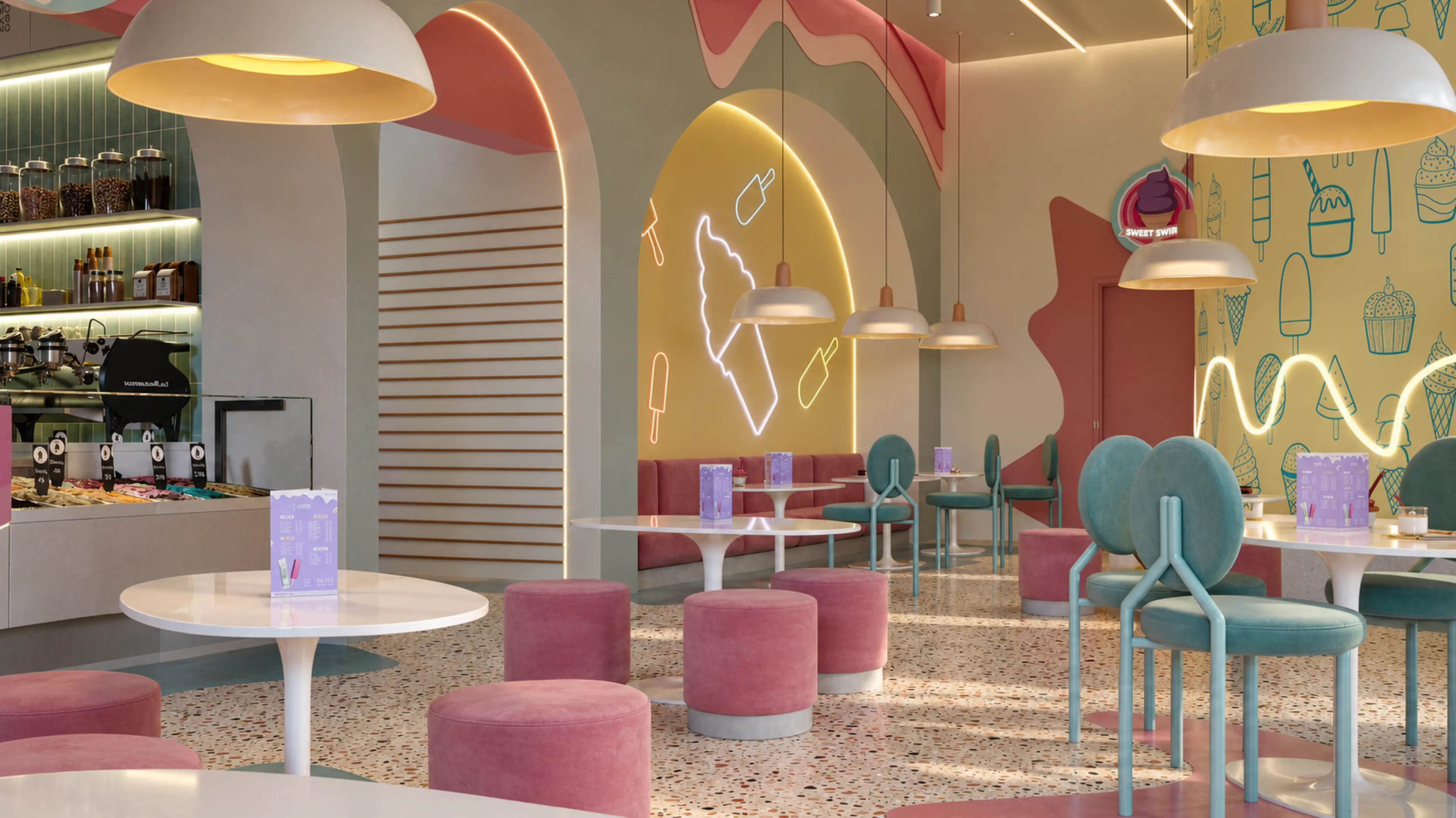 Photographic wide interior view of the ice cream shop and service counter.