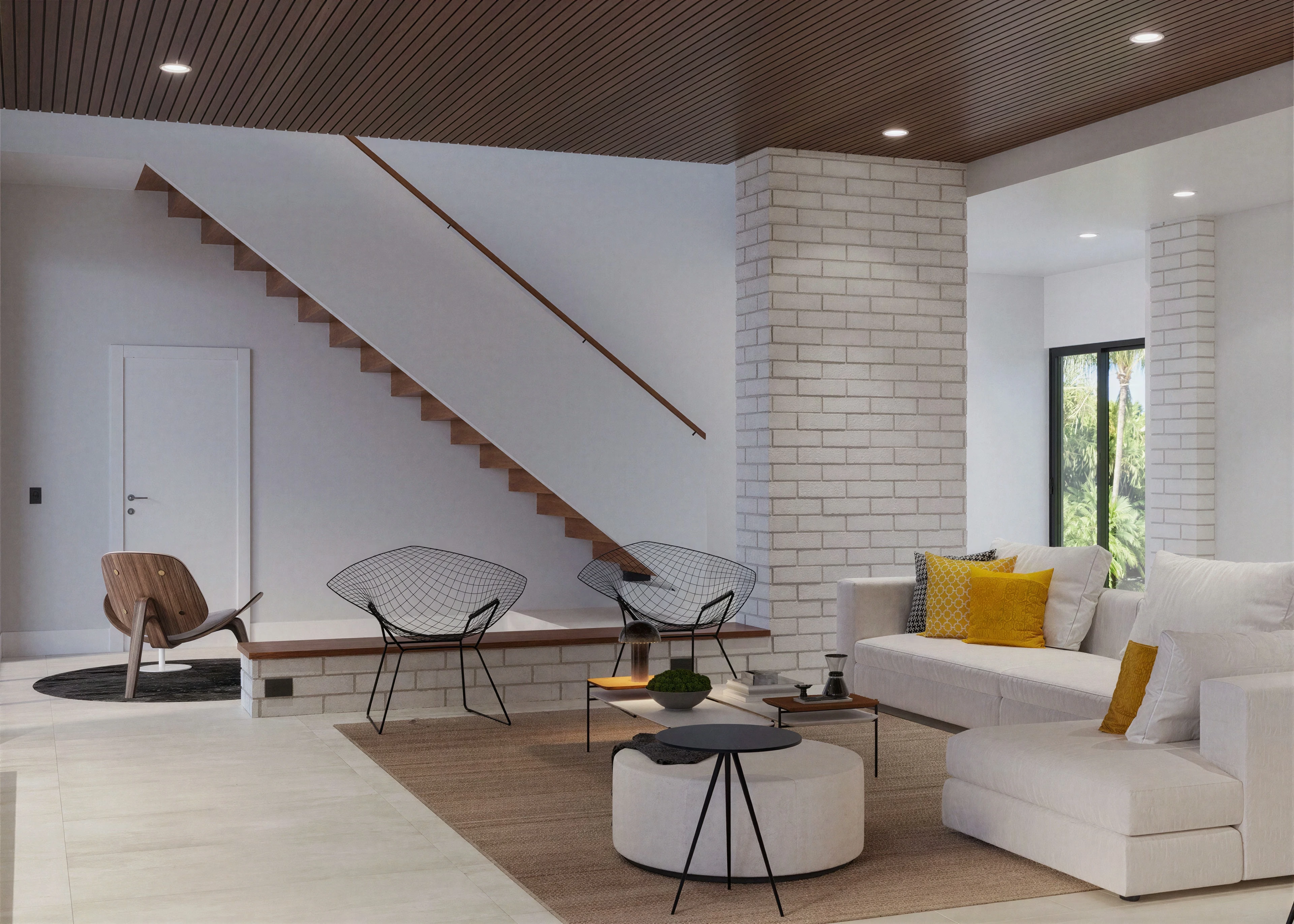 Sitting area beside a staircase with a slim railing.