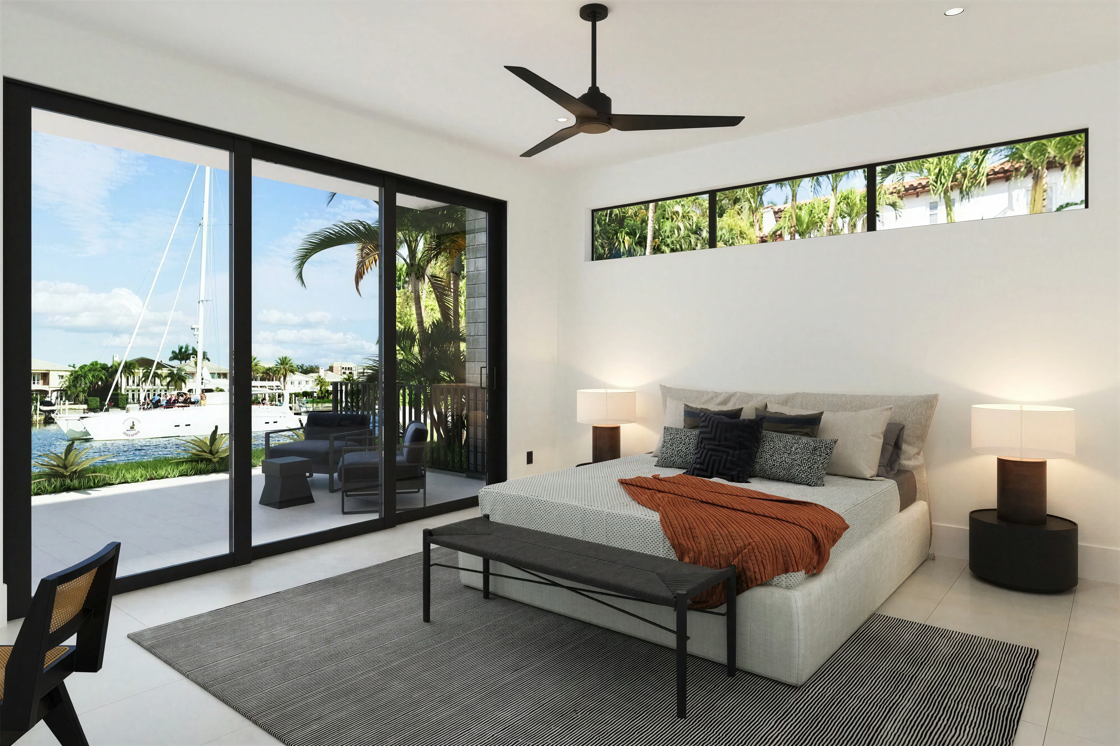 Bedroom opening onto the outdoor area through sliding glass doors.