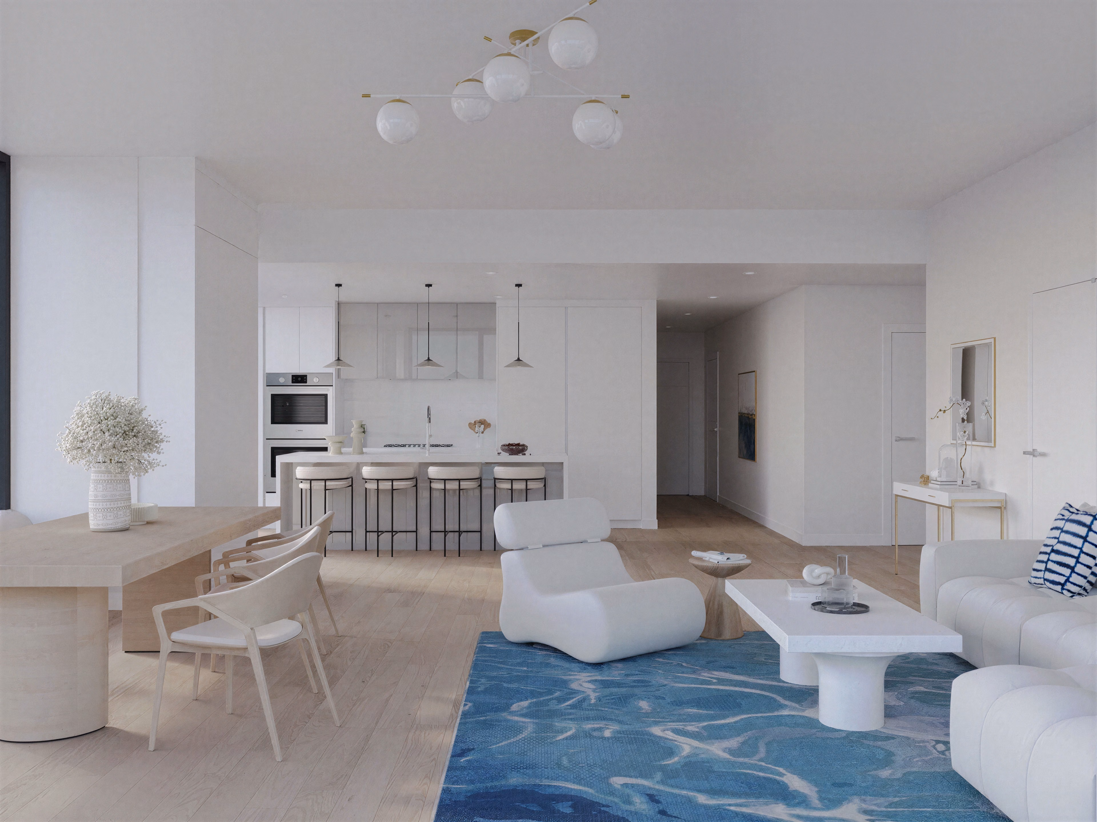 Open living area leading toward the kitchen.
