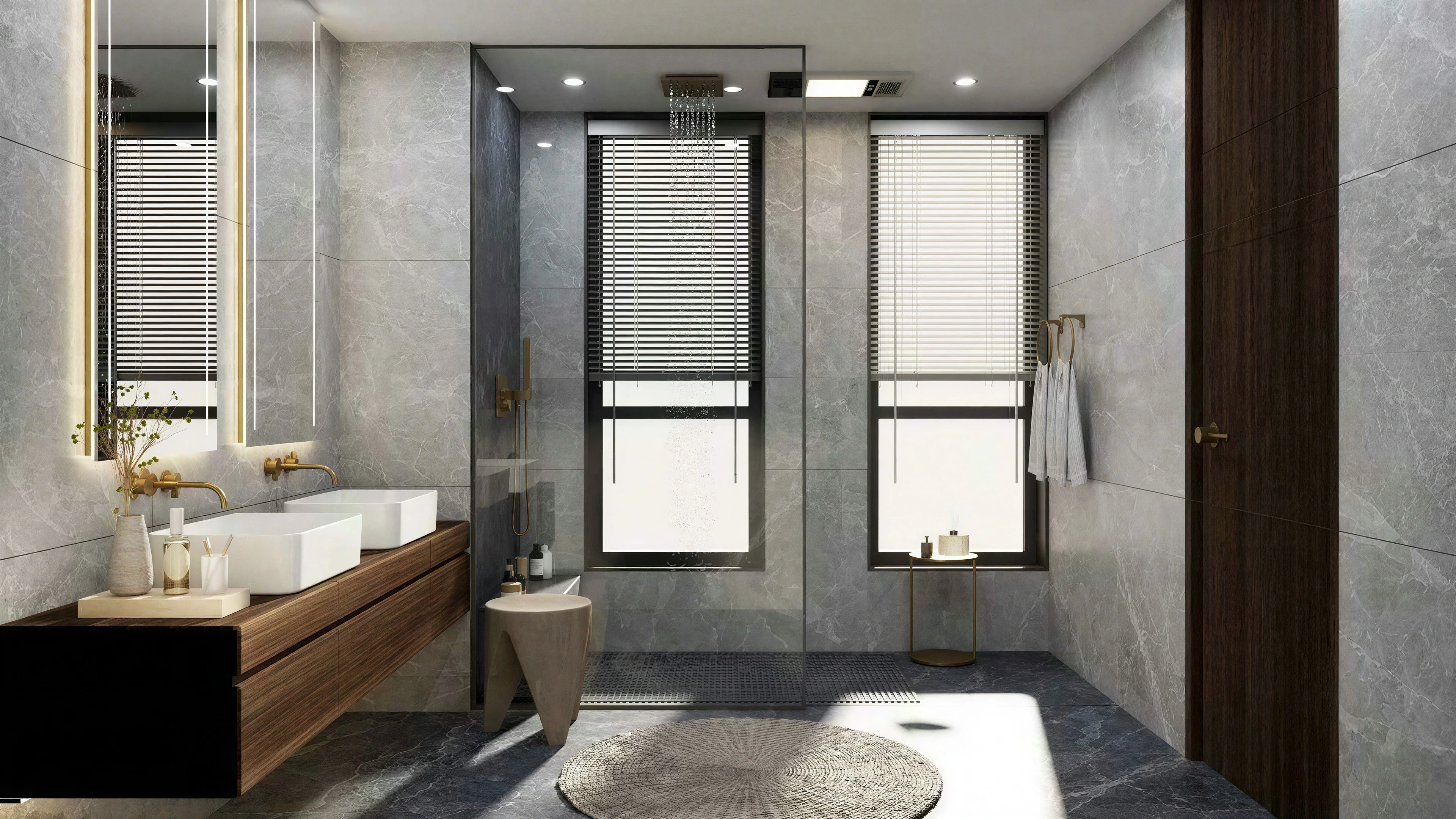 Bathroom vanity and shower beside tall narrow windows.