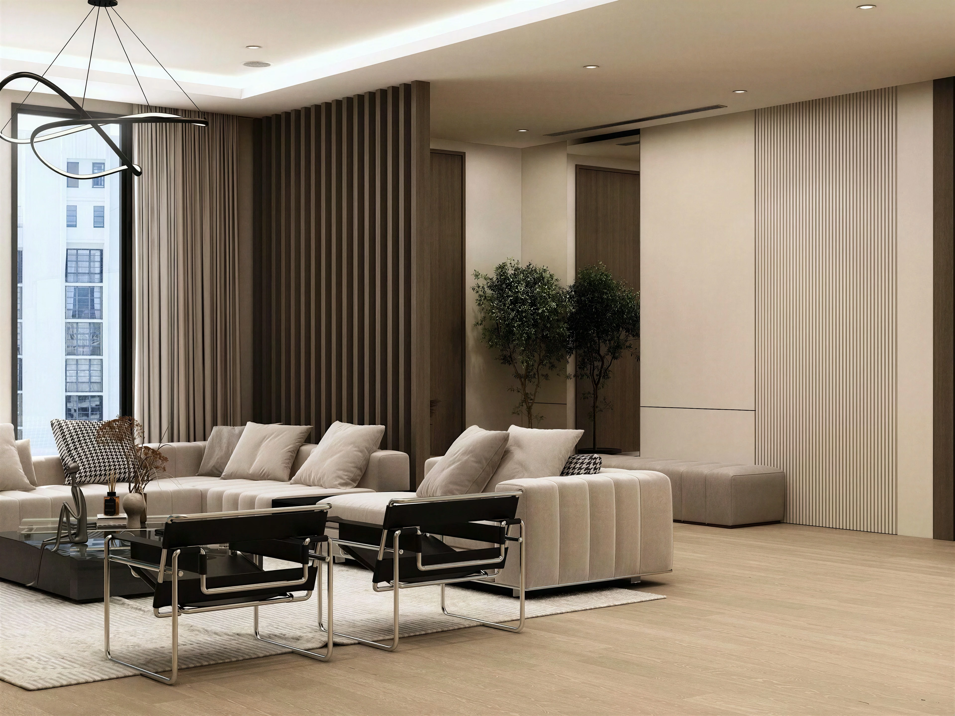 Seating area with nested coffee tables and a large window.