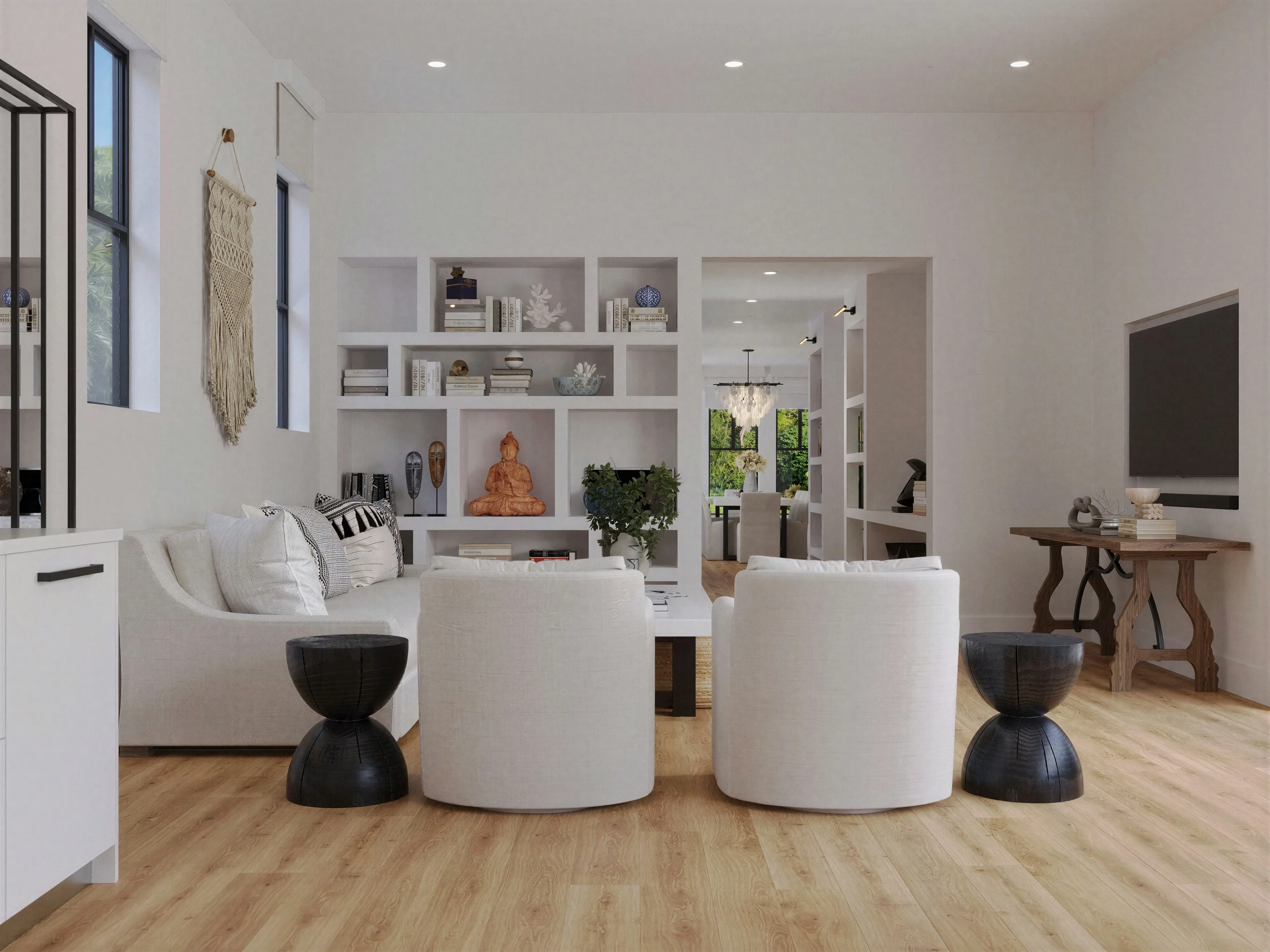 Living room with curved chairs and open display shelves.