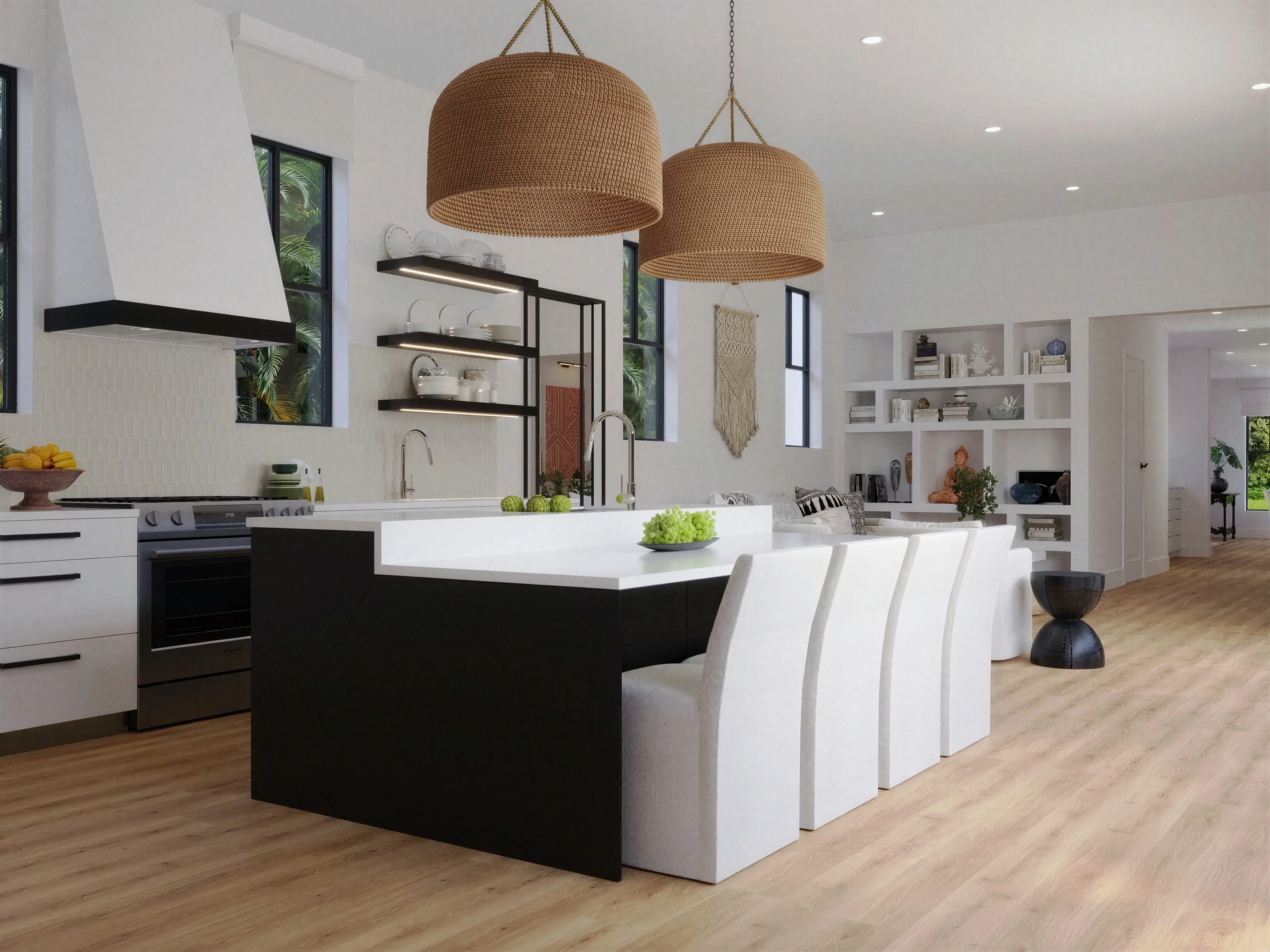Kitchen with a dark island and woven pendant shades.