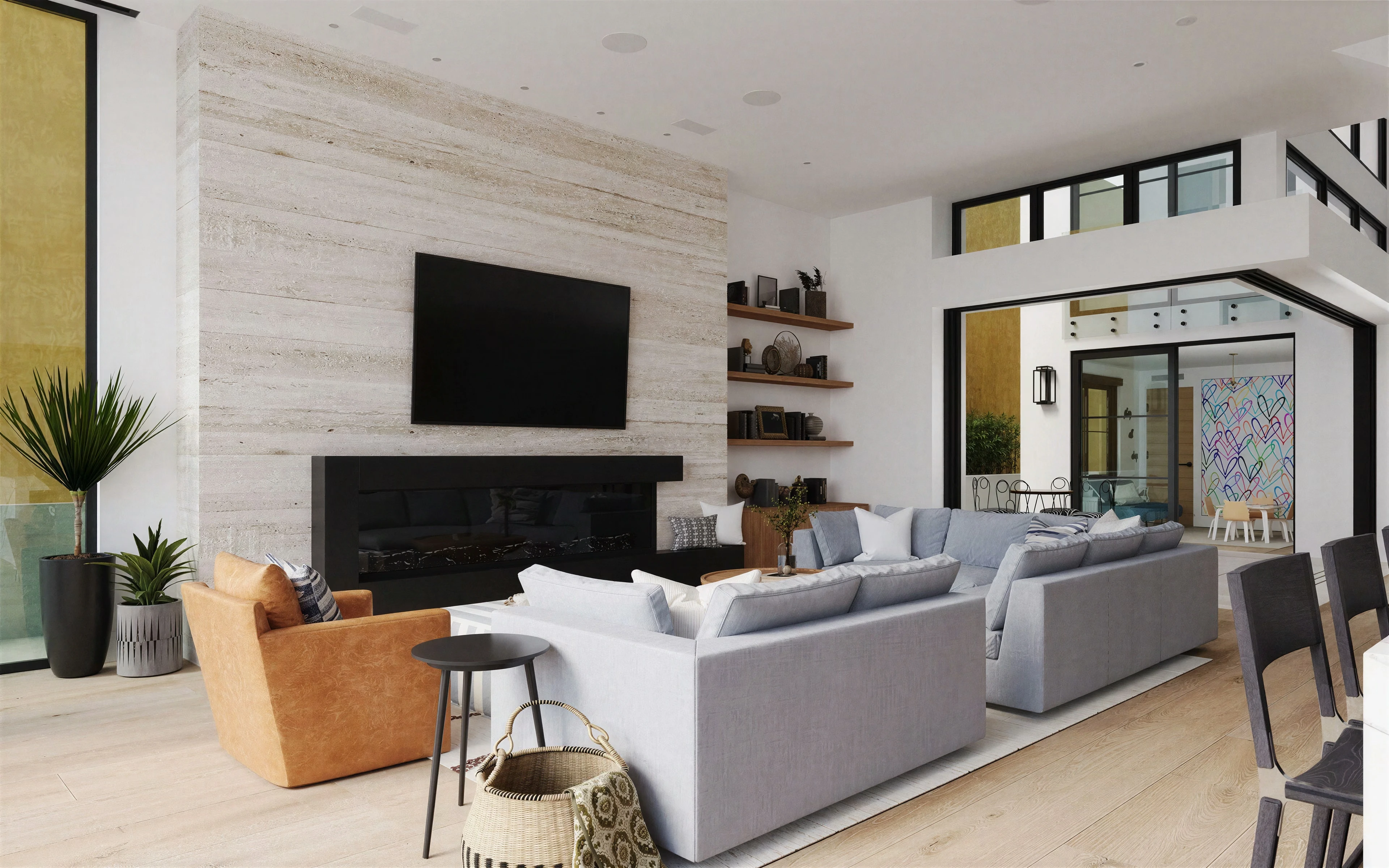 Living room with a stone feature wall, fireplace and built-in shelves.