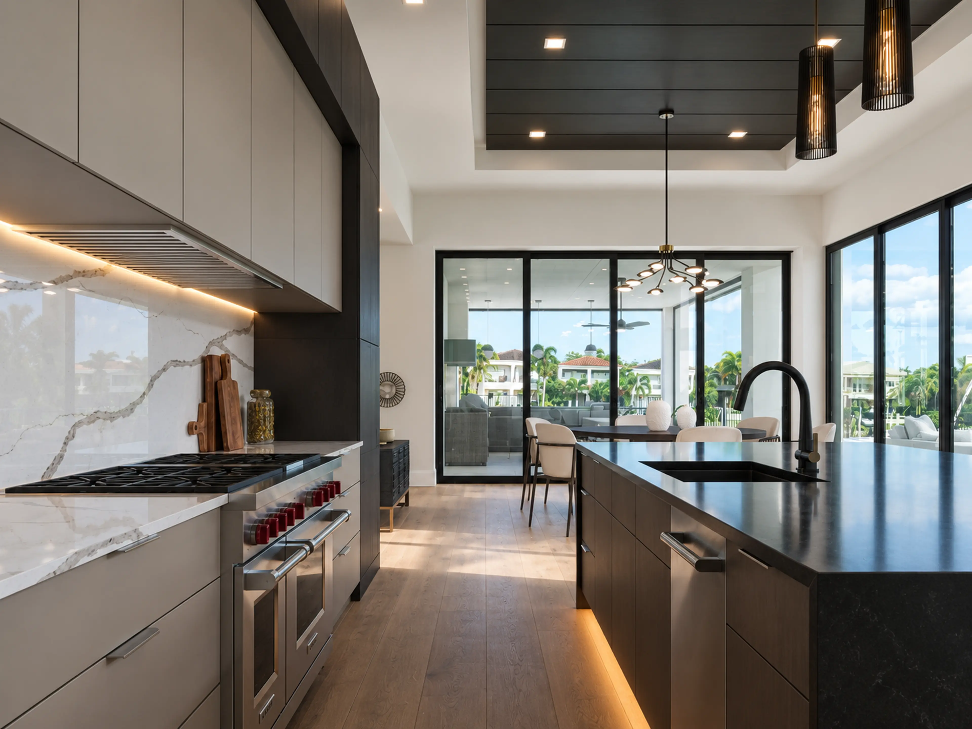 Galley kitchen connecting the island to the dining area.