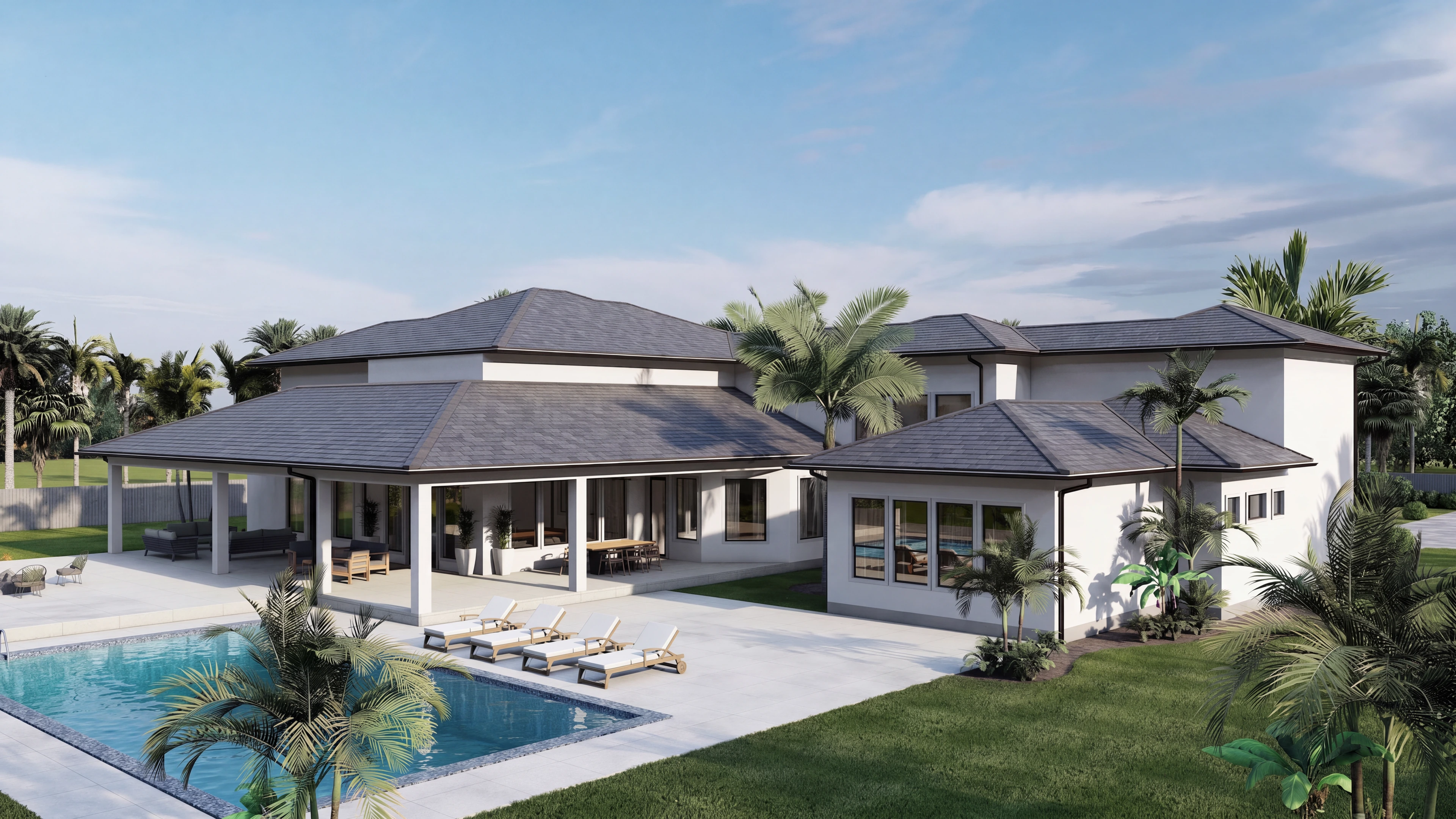 Pool terrace wrapping around the rear of the home.