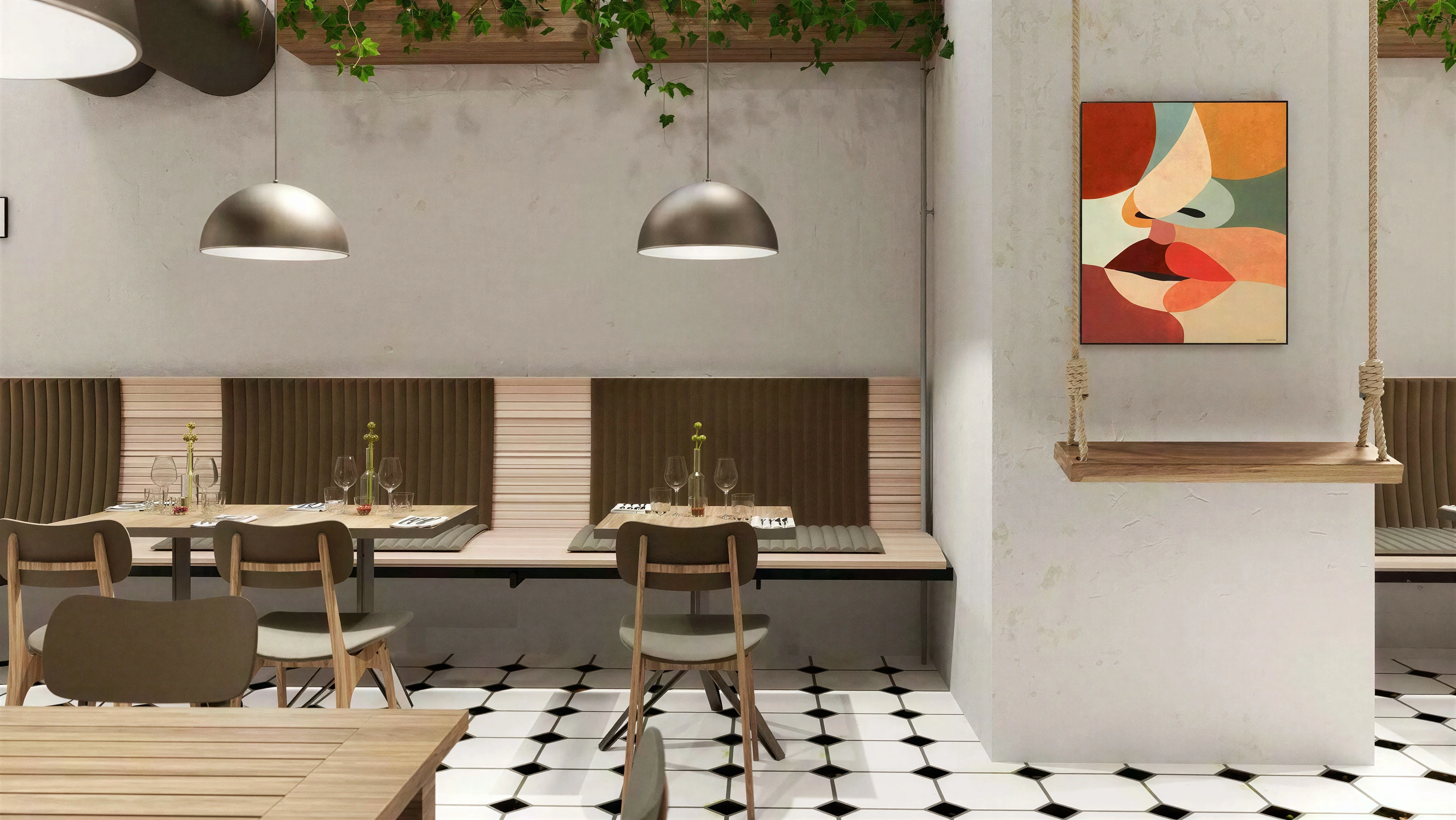 Booth seating beneath pendant lights and abstract artwork.