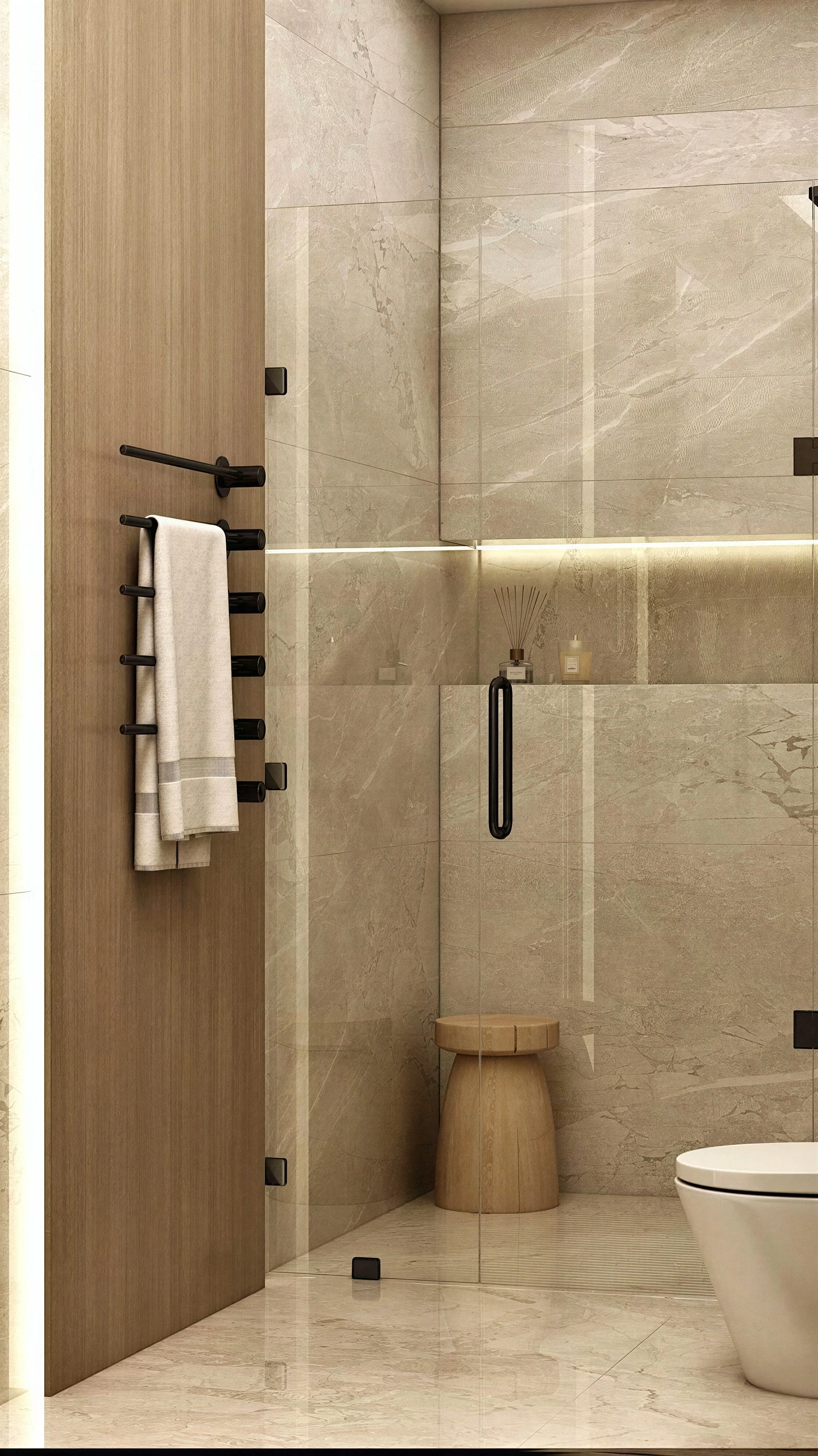 Compact shower enclosure with pale tile and black fittings.