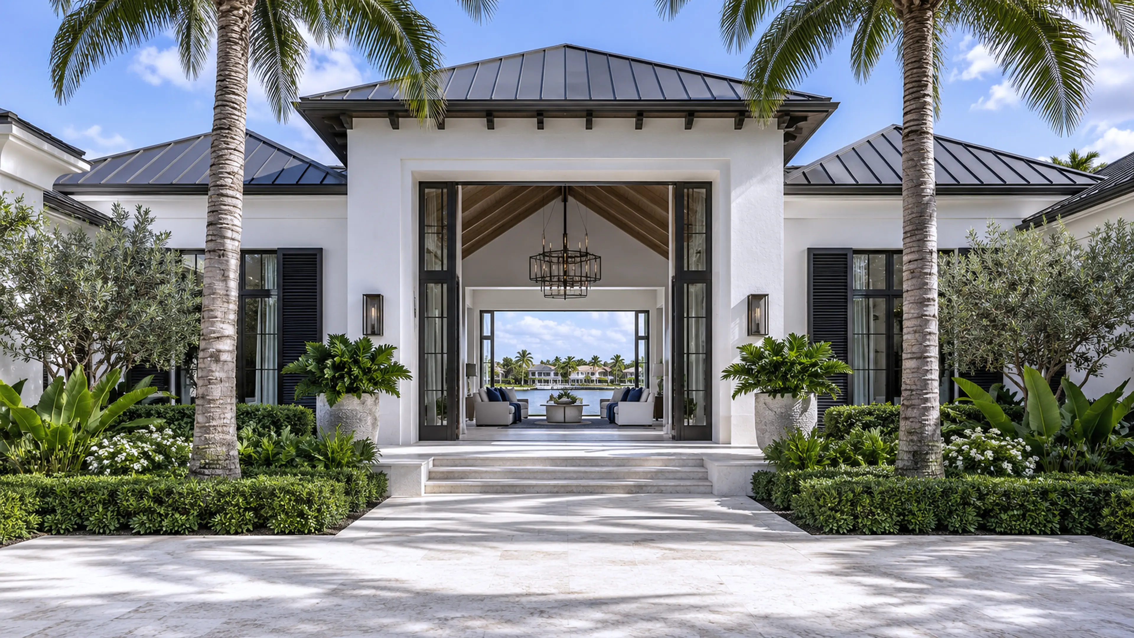 Completed Contemporary West Indies waterfront estate with a central water axis and Coastal Contemporary detailing.
